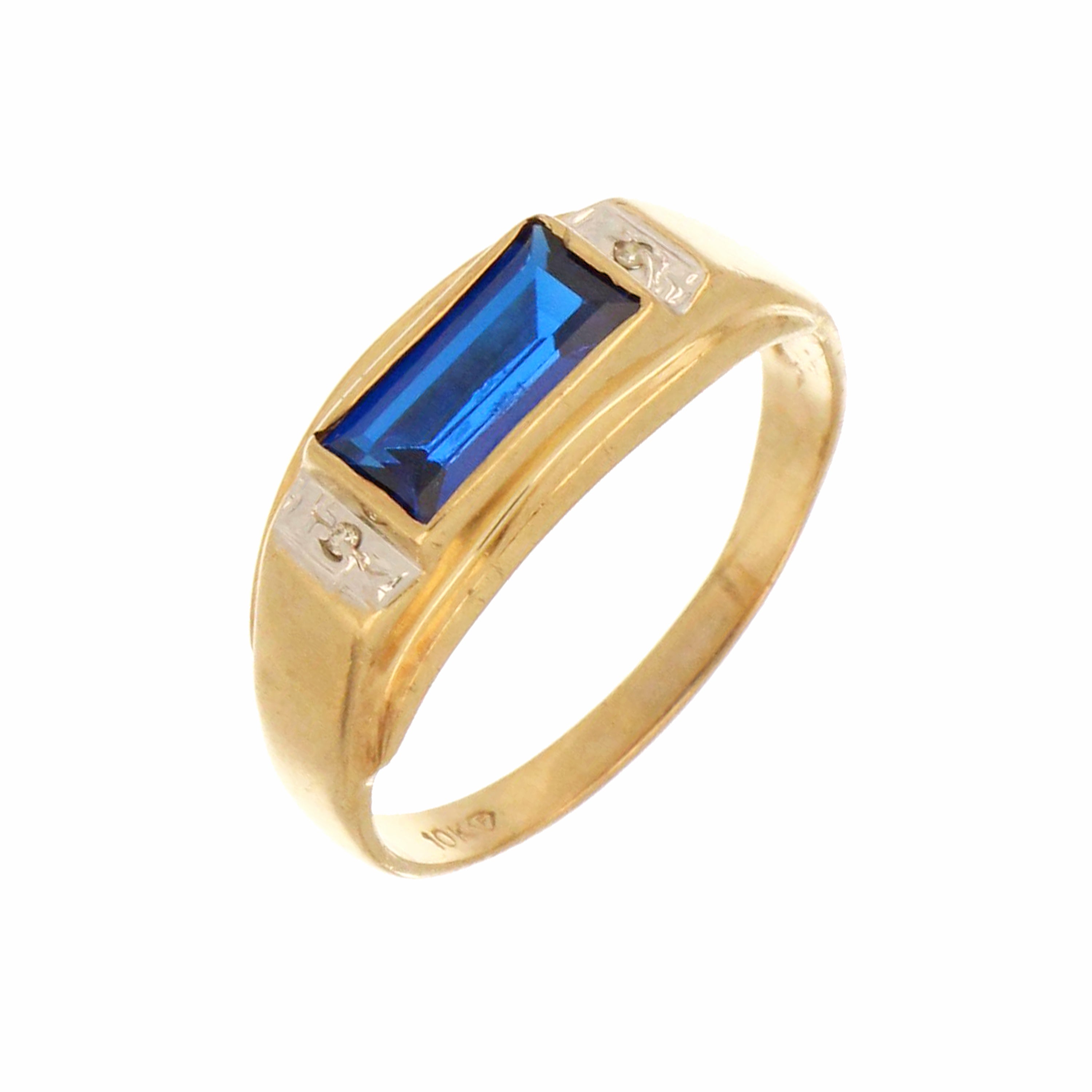Modern yellow gold ring featuring vivid blue rectangular gemstone and side accents.