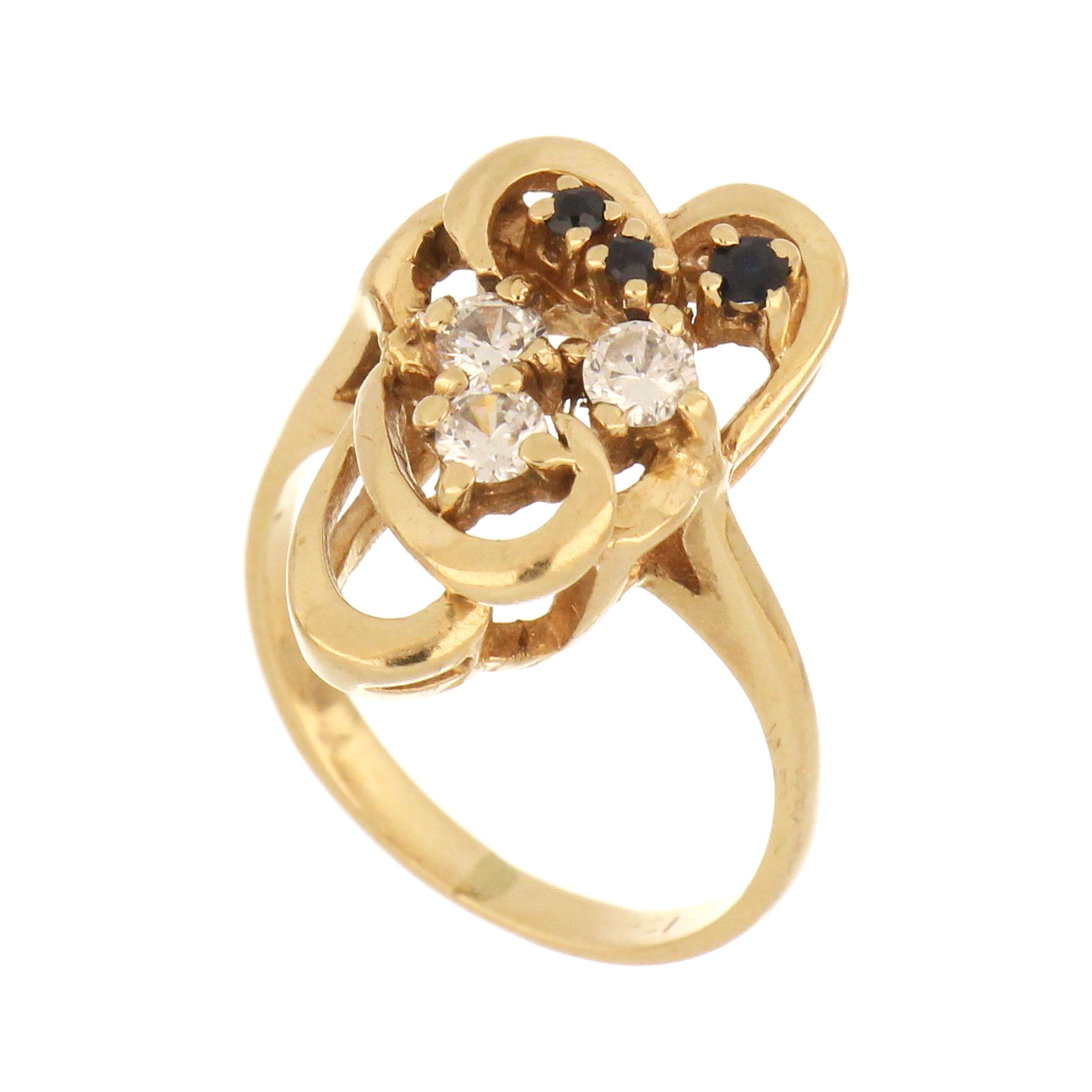 Elegant 10kt yellow gold ring with sapphire and cubic zirconia stones. Vintage swirl design, size 5.75. Pre-owned, sold as is.