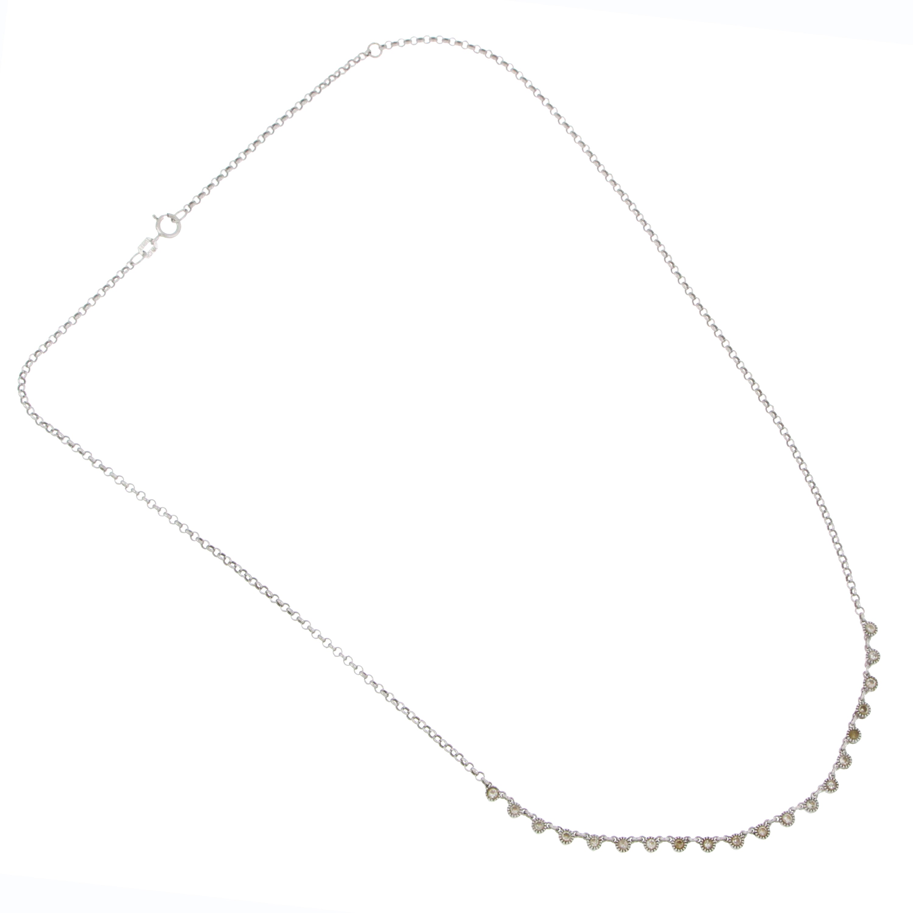 Delicate white gold chain featuring bezel-set round diamonds