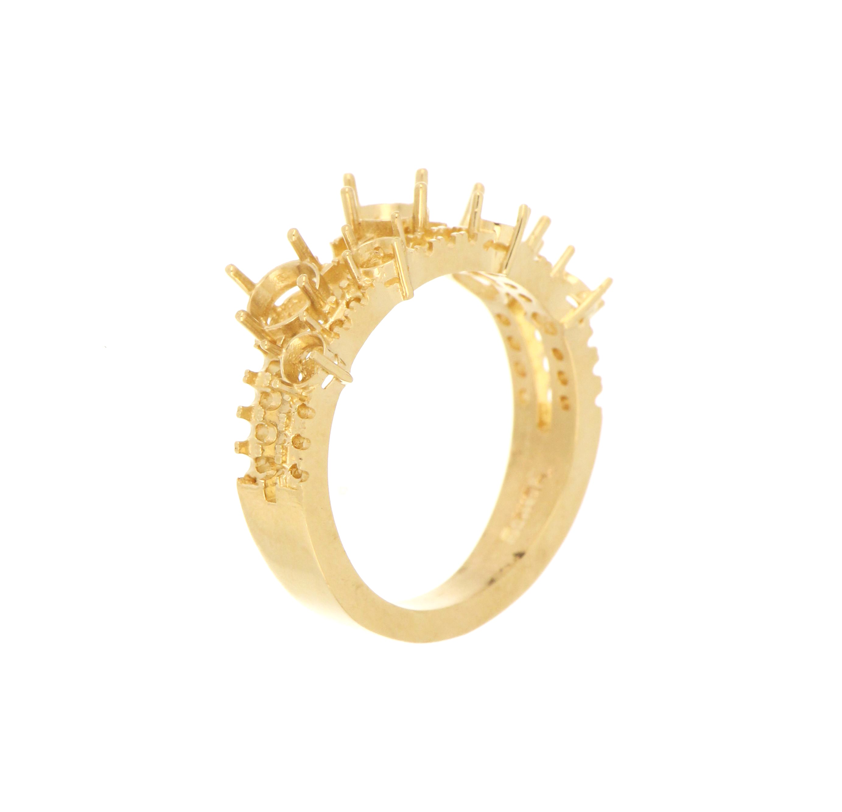 Yellow gold ring setting designed for 6 large and 23 small round stones