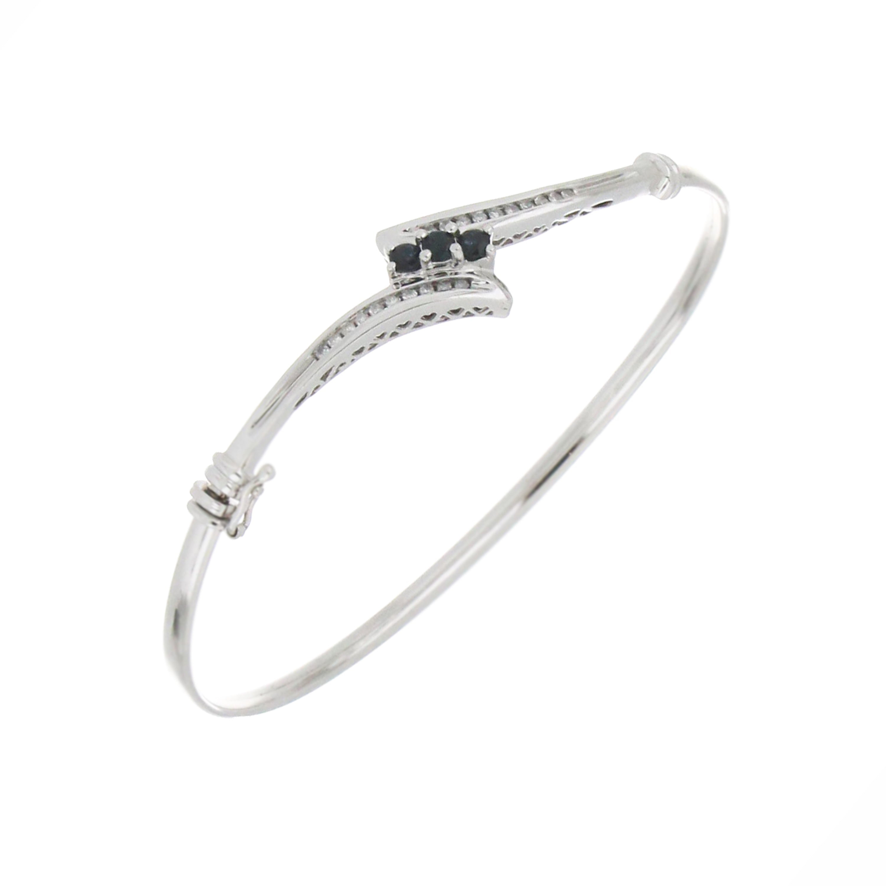Elegant sapphire and diamond bangle bracelet in polished white gold
