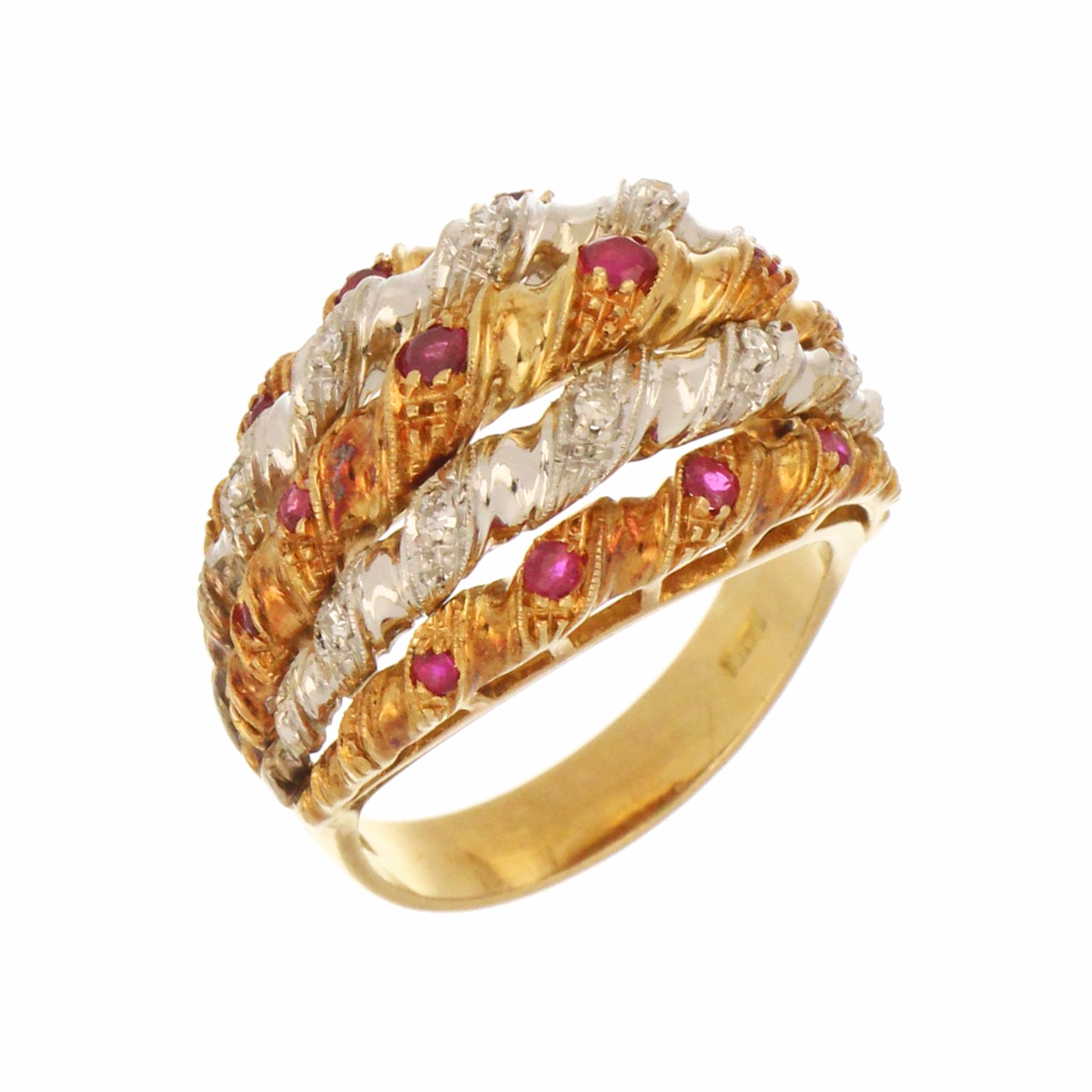 Two-tone gold dinner ring featuring 13 rubies and 10 small diamonds.