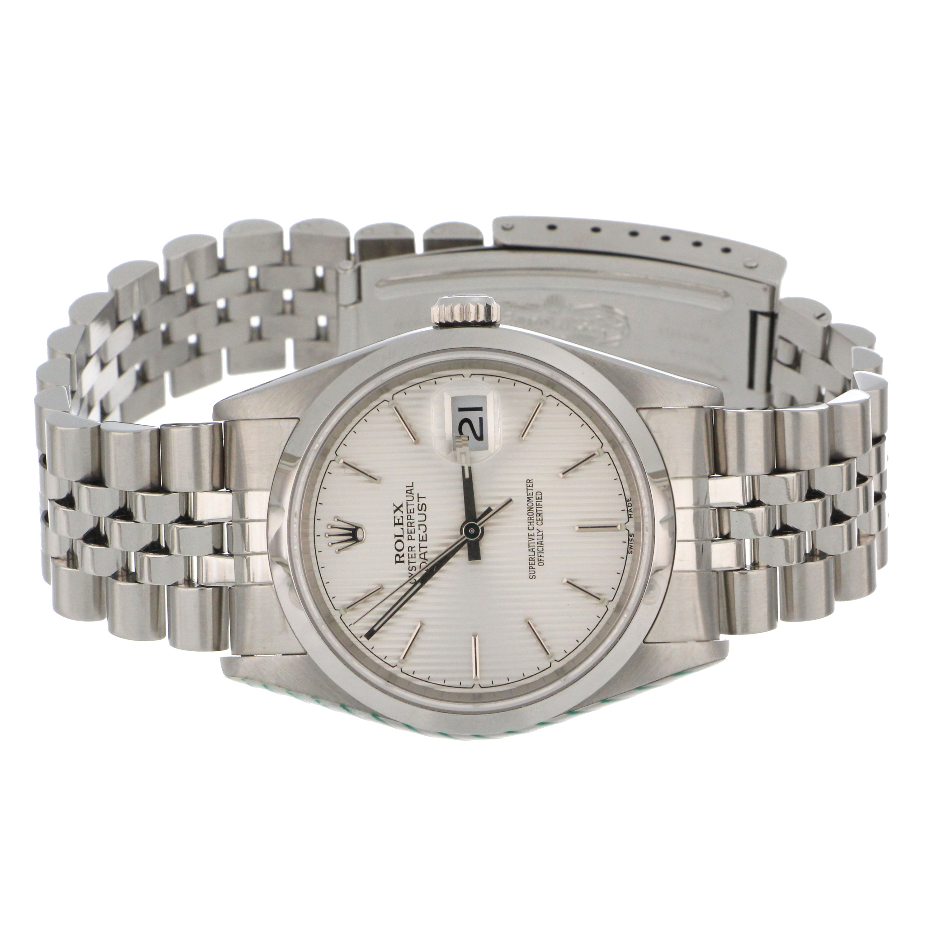 Rolex Oyster Perpetual Datejust silver dial with luminous hands and date window close-up