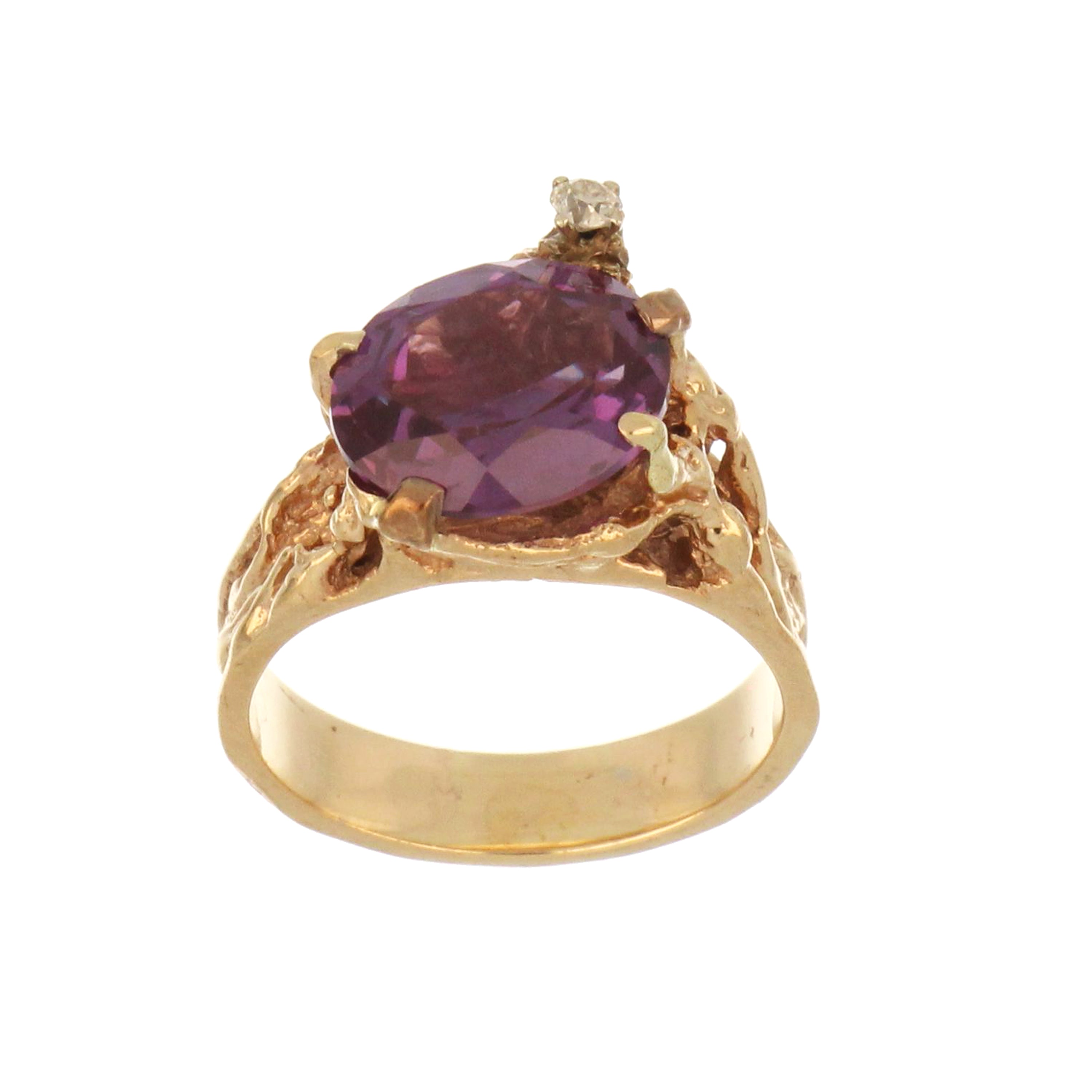 10kt yellow gold dinner ring featuring an oval synthetic alexandrite, side angle, weighing approximately 6.72 grams