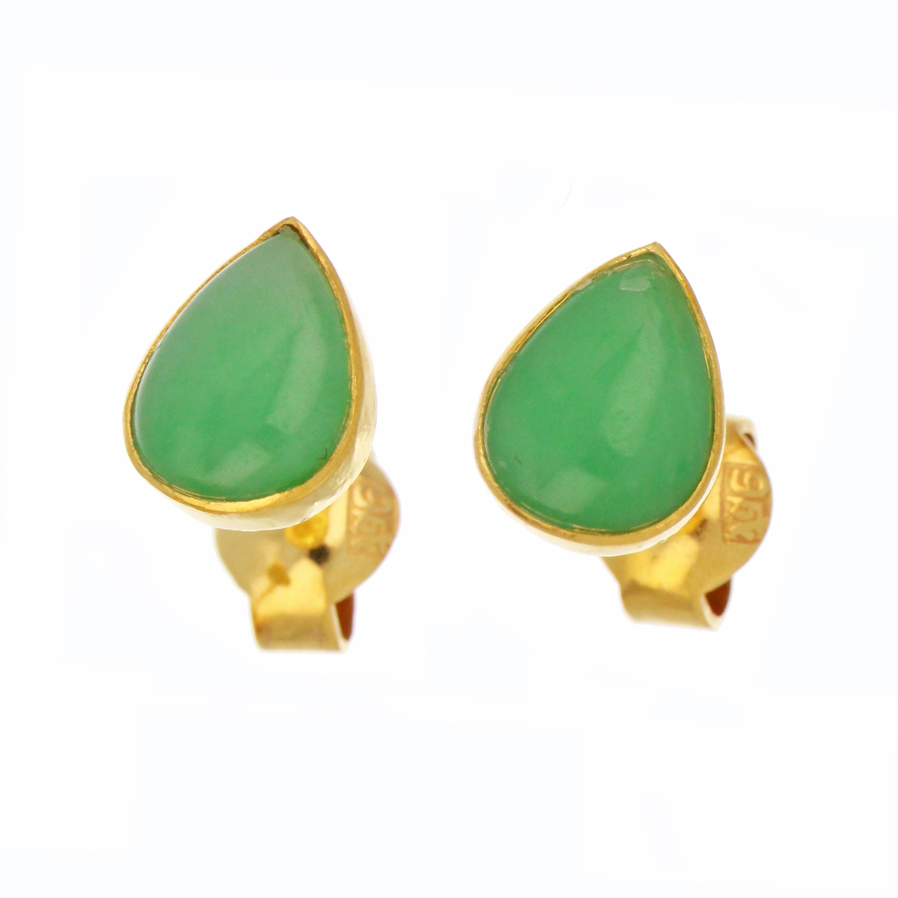 Close-up of 22kt yellow gold jadeite jade stud earrings featuring pear-shaped green jade stones in full bezel setting