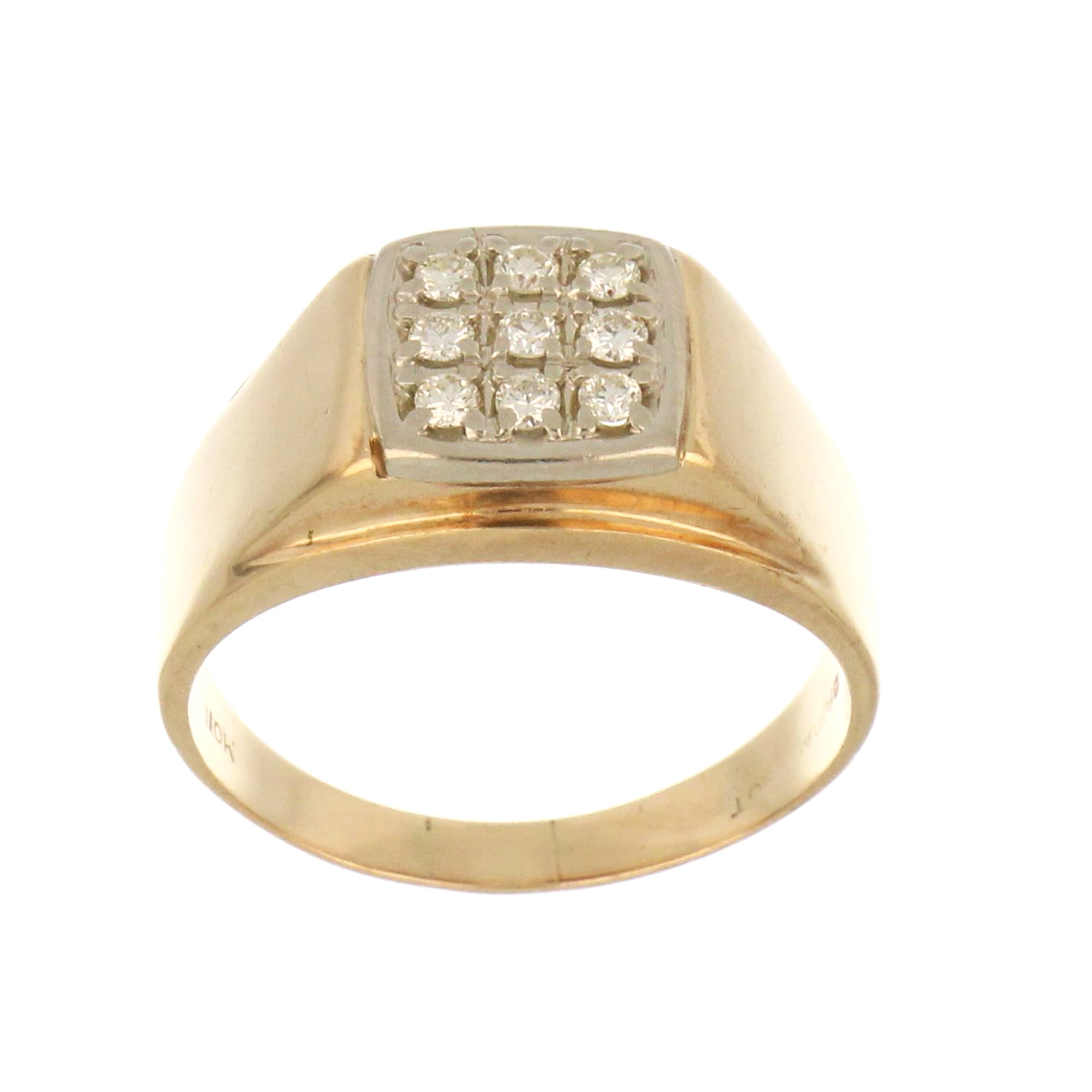 Close-up of 10kt yellow gold diamond band ring showing nine round brilliant cut diamonds in a classic band style, weighing 7.08 grams