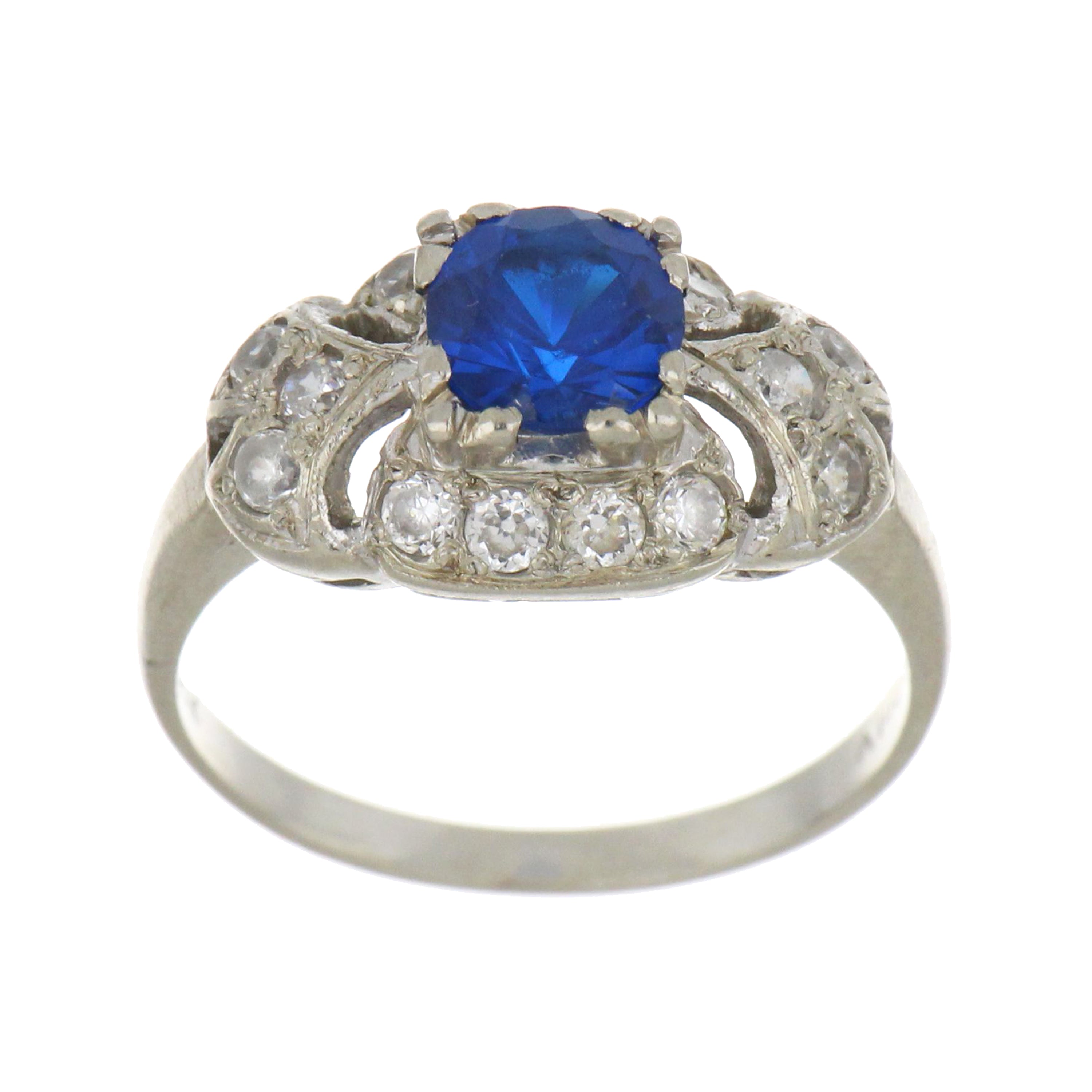 14kt white gold ring featuring 6mm round blue cubic zirconia, top view showcasing stone color and band shine