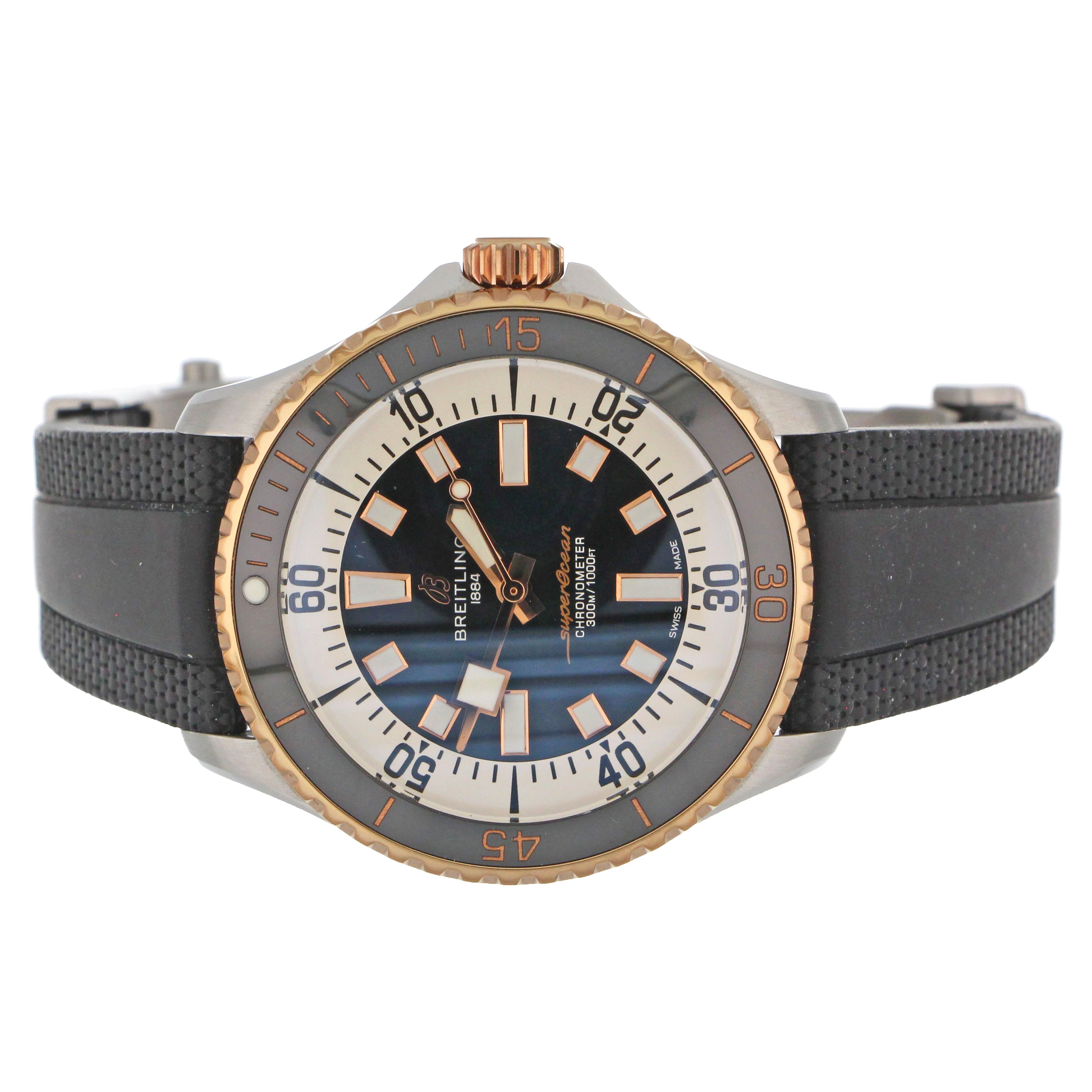 Men's Breitling SuperOcean watch front view showing black dial, stainless steel case, and rose gold bezel.