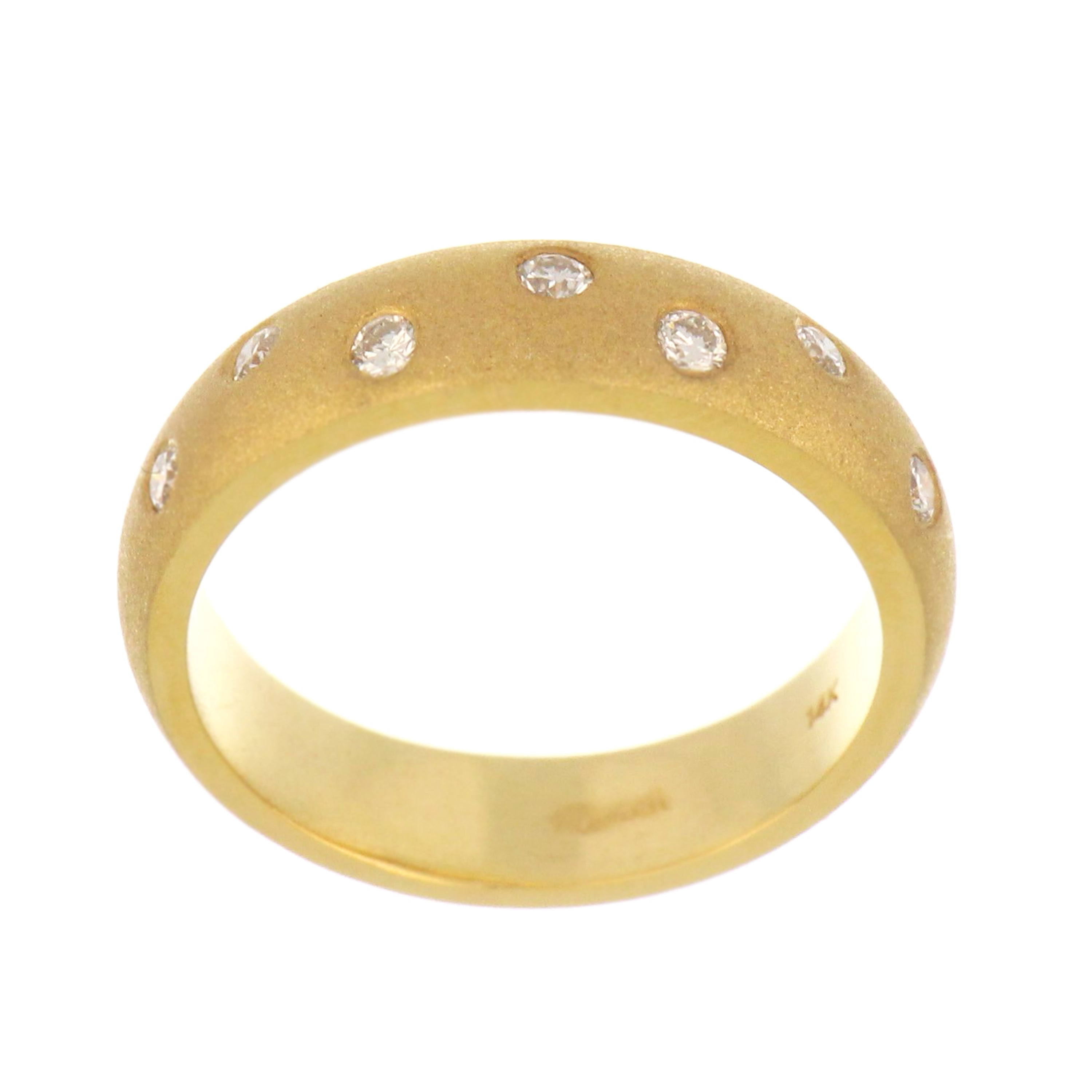 Close-up showing brushed finish on 4.5mm wide 14kt yellow gold diamond band with colorless diamonds