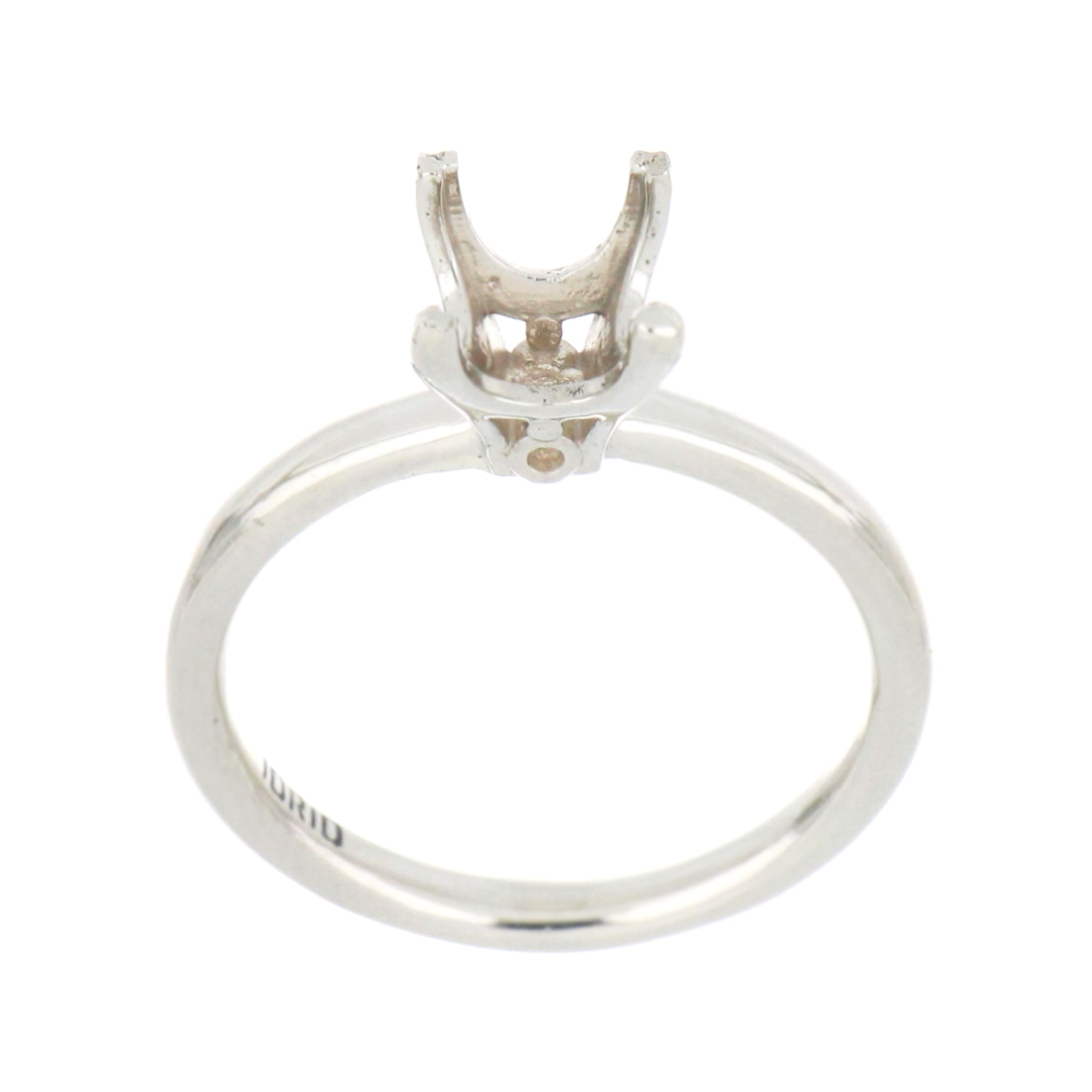 14kt white gold solitaire ring mounting, 4-claw setting, 7mm round stone fit, showing polished shank, close-up angle