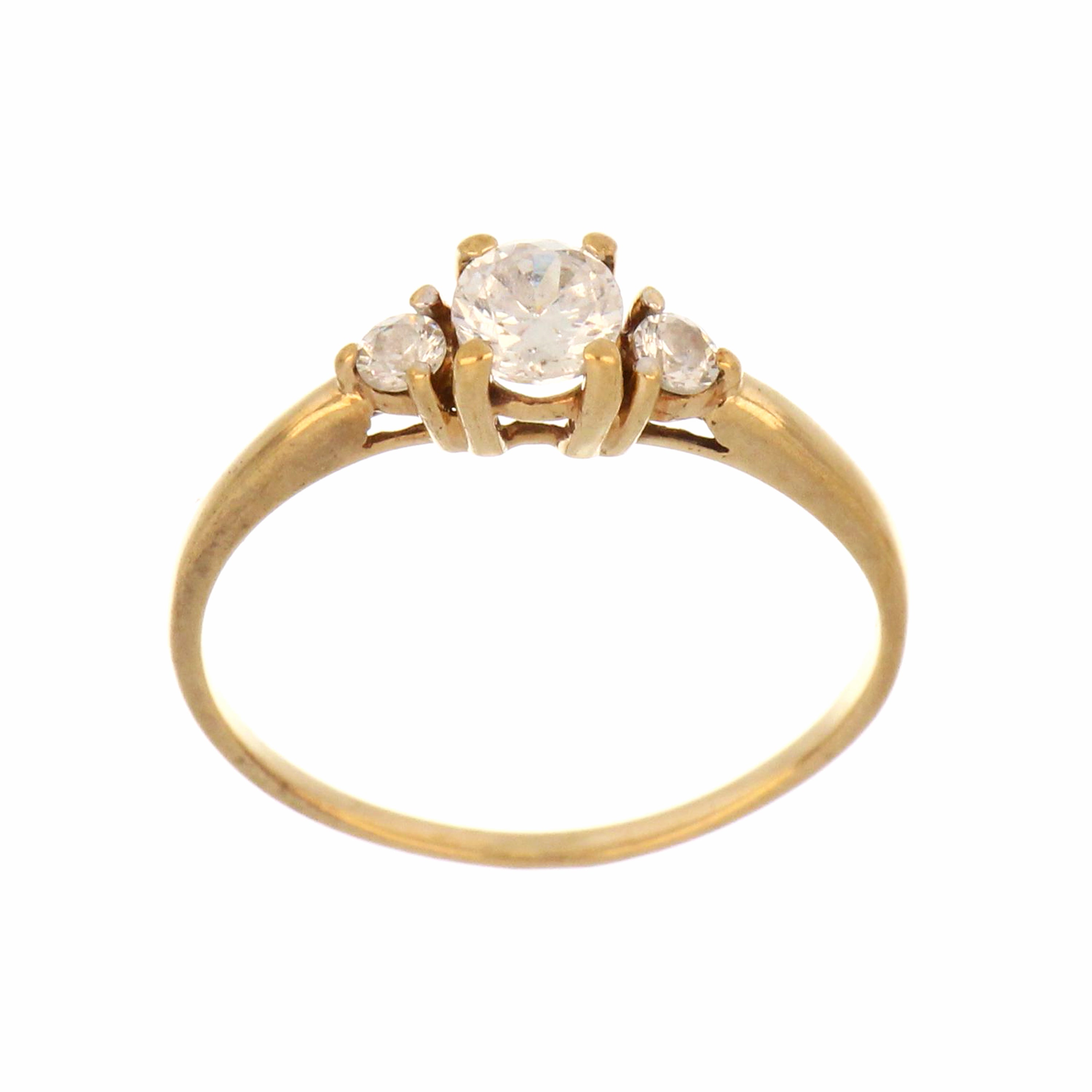 Close-up of 10kt yellow gold ring with multiple sparkling cubic zirconia stones set on band, angle showing top and side details, approx 1.45 grams