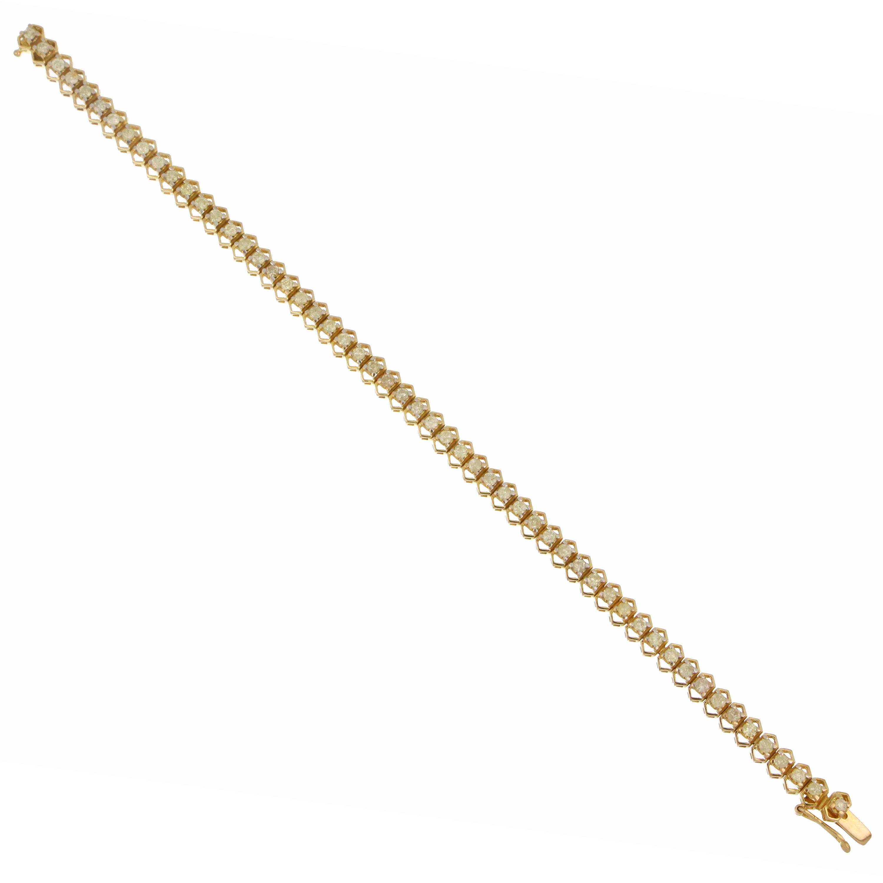 Close-up side angle of 14kt yellow gold diamond bracelet showcasing craftsmanship and diamond setting