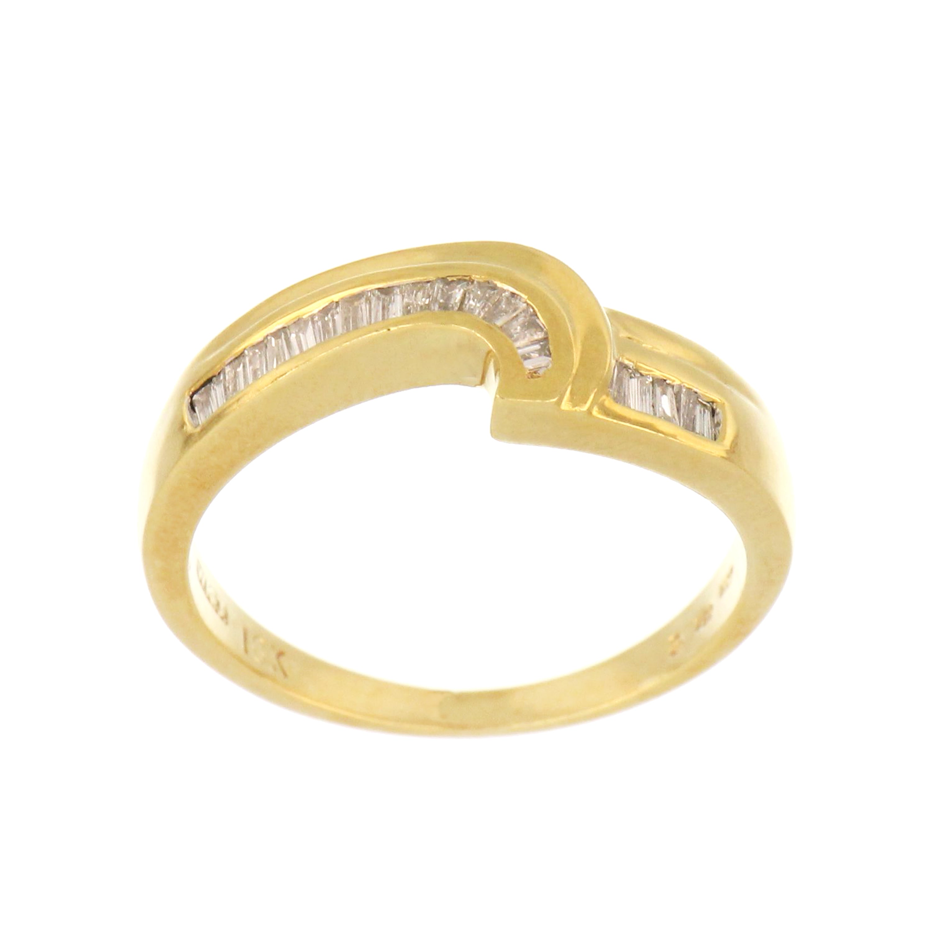 18kt yellow gold diamond band featuring 20 baguette-cut diamonds set in a channel setting, shown from a top angle highlighting diamond layout