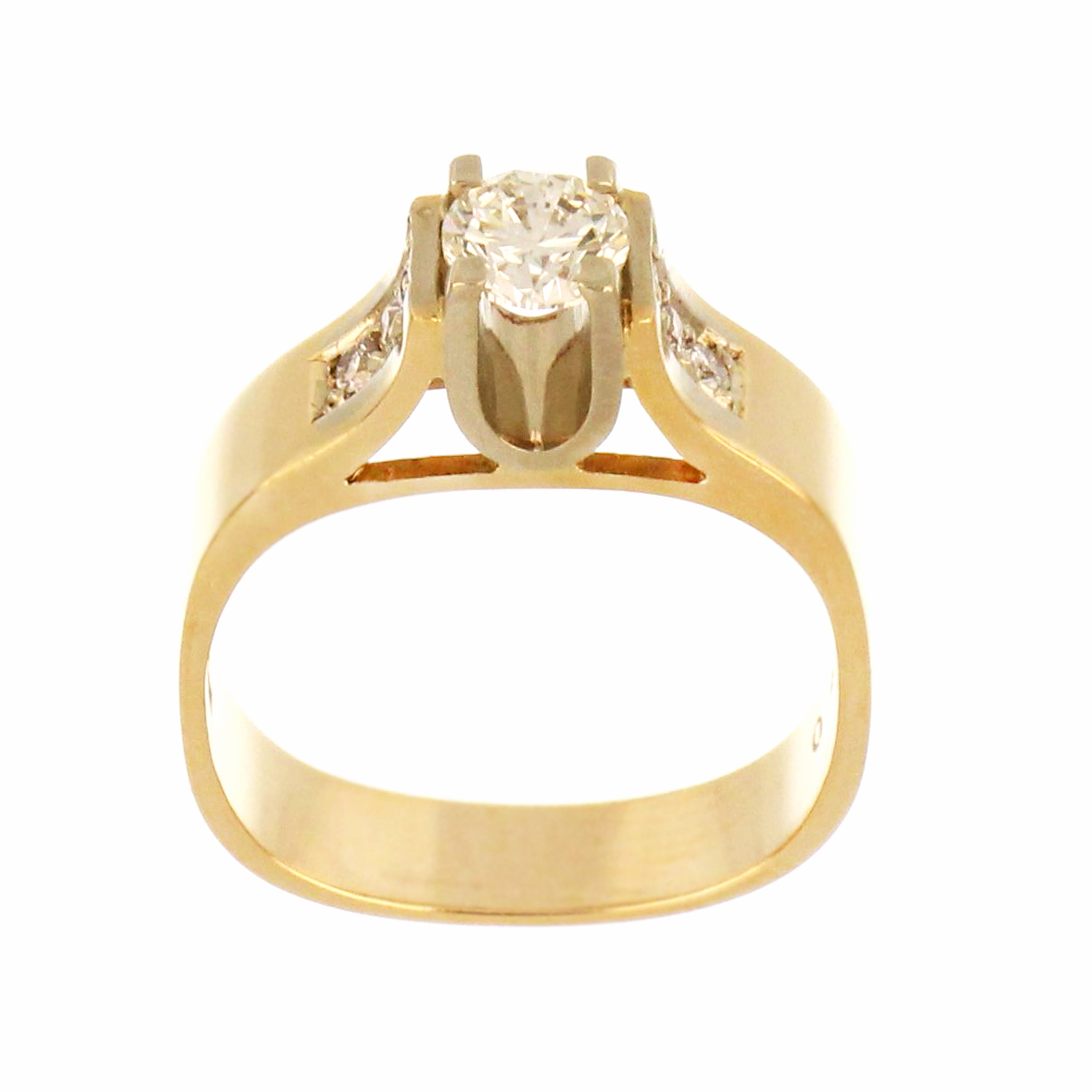 Close-up of 14kt yellow gold diamond engagement ring with round brilliant center stone and claw setting