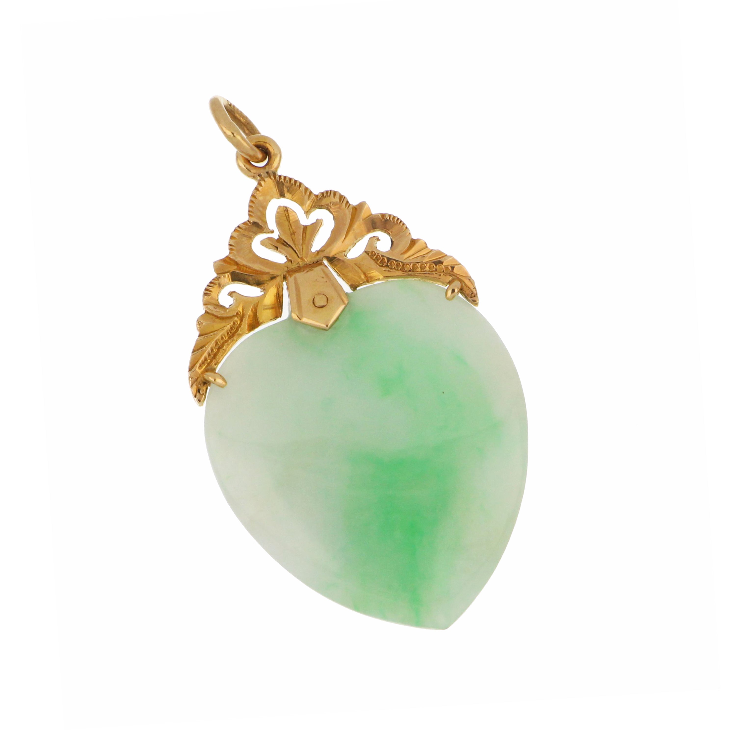 18kt yellow gold pendant featuring a semi-transparent light green heart-shaped jadeite jade measuring approximately 26x24 mm, elegant design