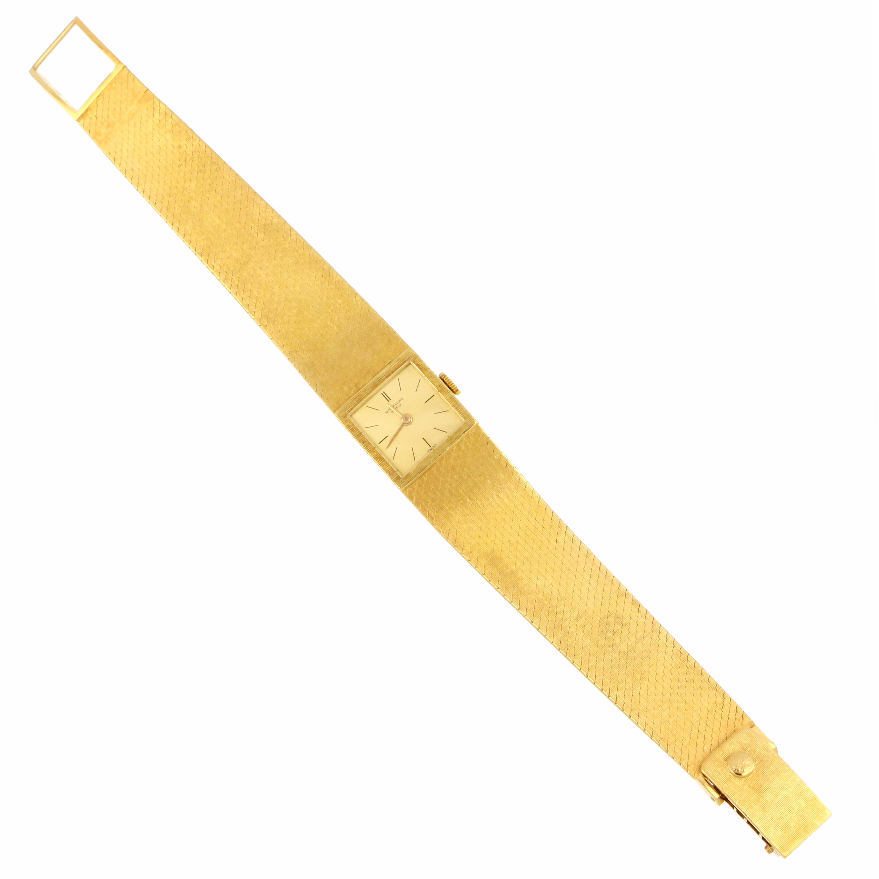 Detailed view of clasp and bracelet links on Patek Philippe yellow gold ladies watch