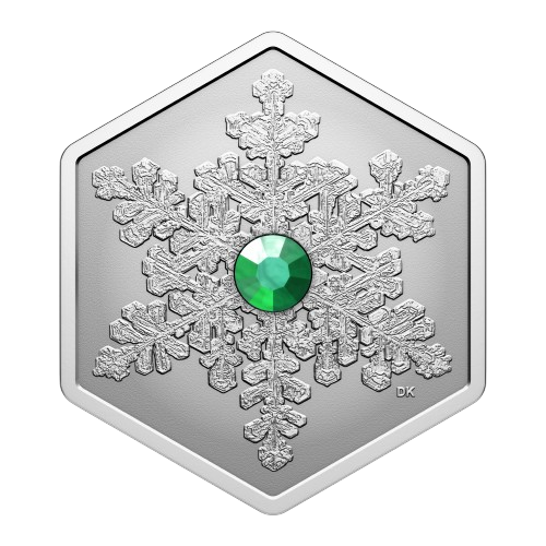 Silver hexagonal coin with intricate snowflake design and central green crystal accent.
