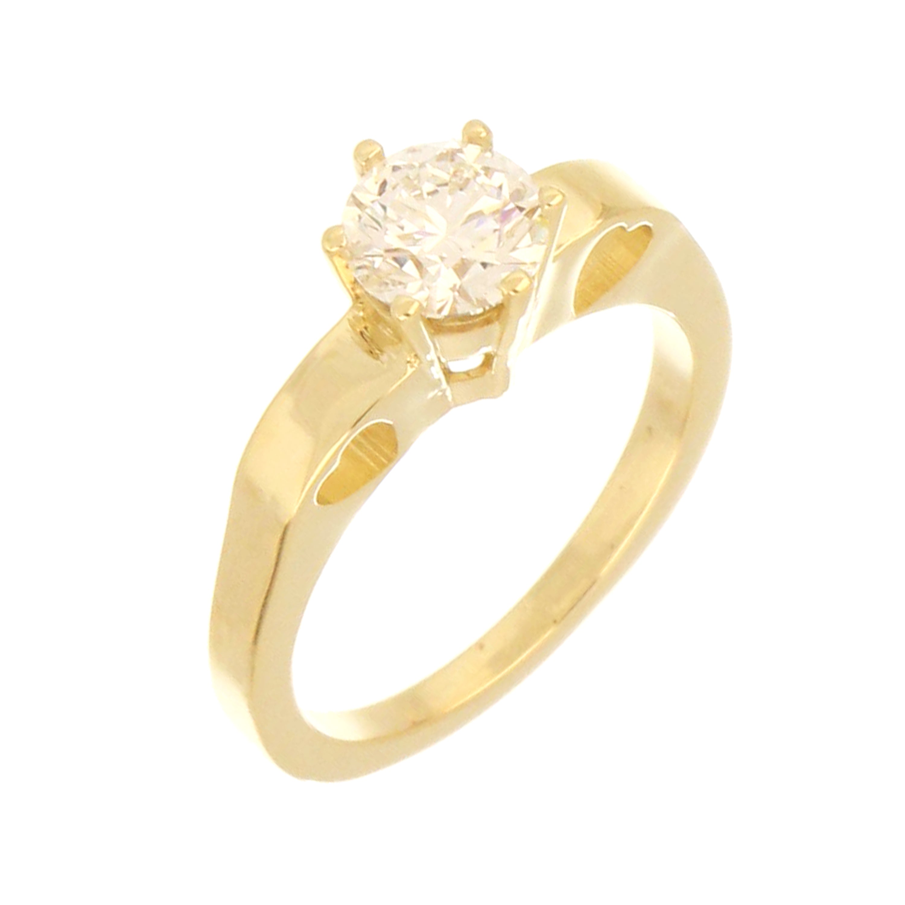 Close-up angle of 14kt yellow gold ring featuring claw setting holding round lab grown diamond