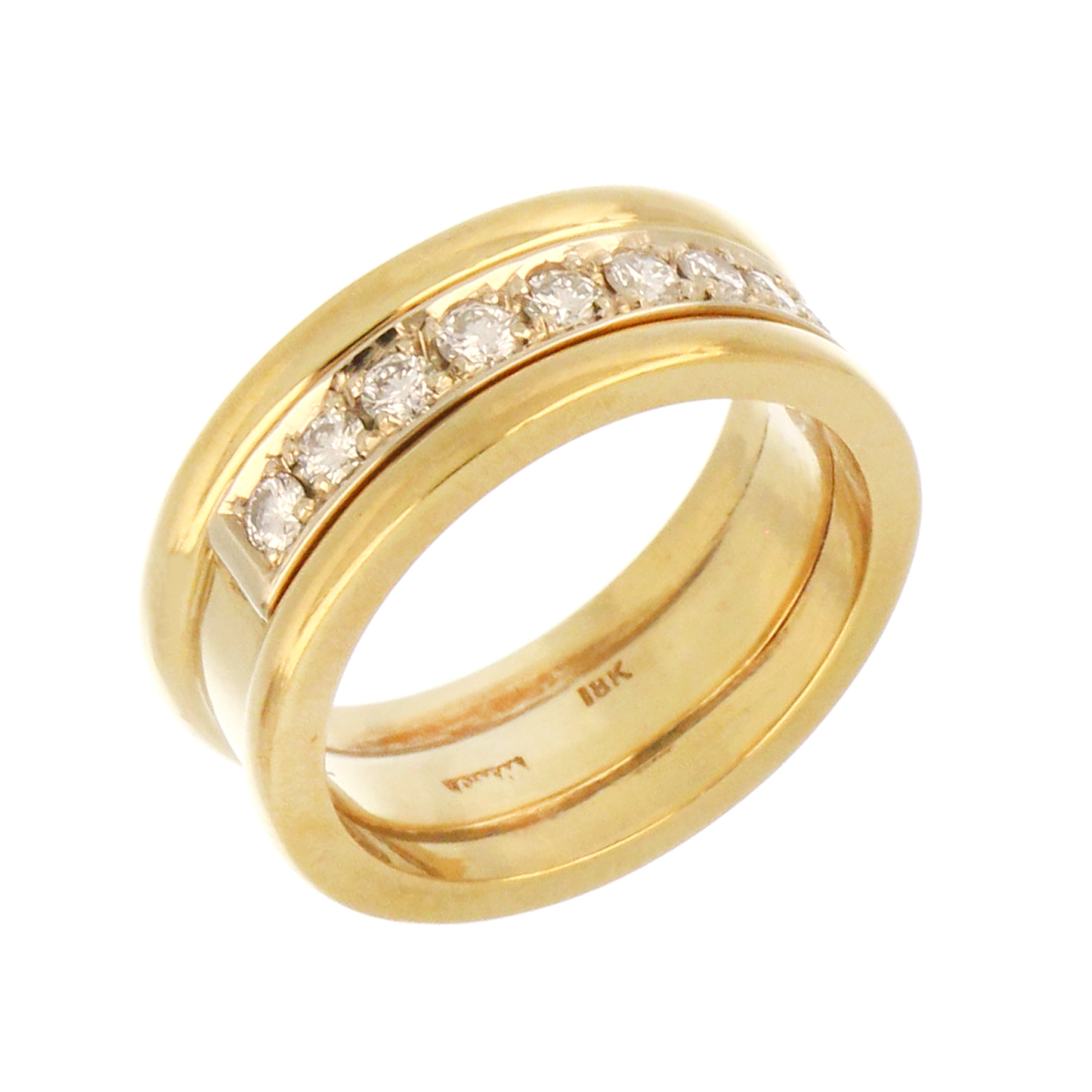 Side angle of 18kt yellow gold diamond band highlighting the claw diamond setting and smooth gold band