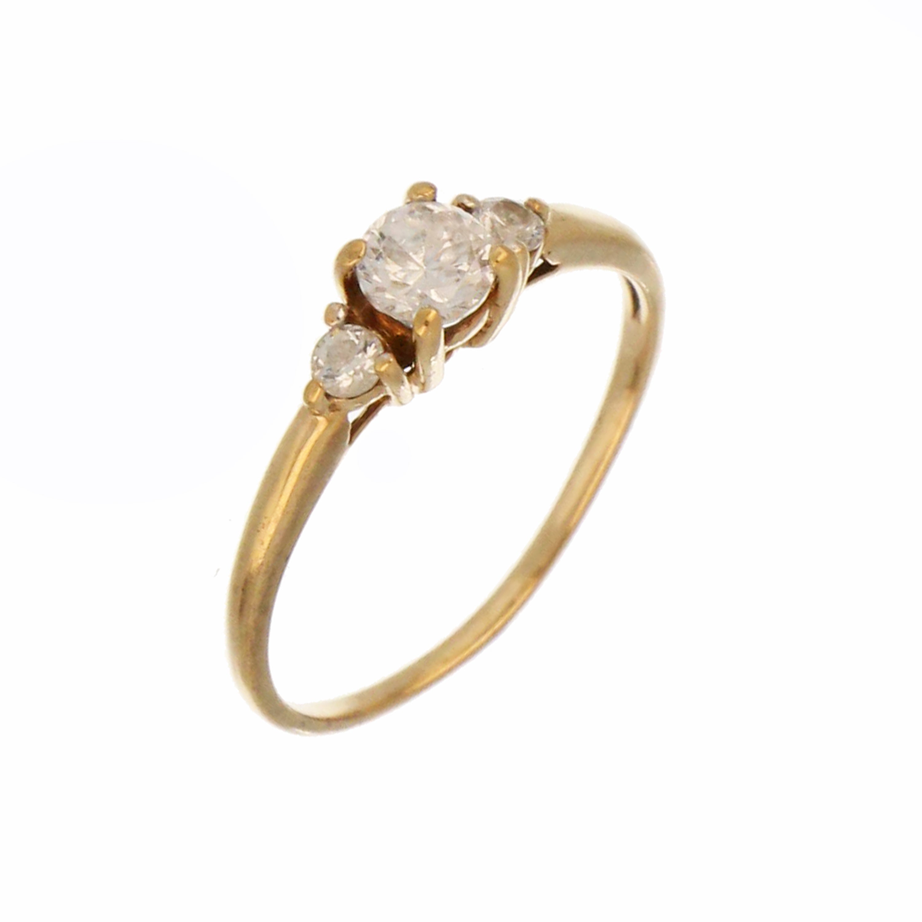 Side angle of pre-owned 10kt yellow gold CZ ring size 8 showcasing smooth polished band and bright CZ stones