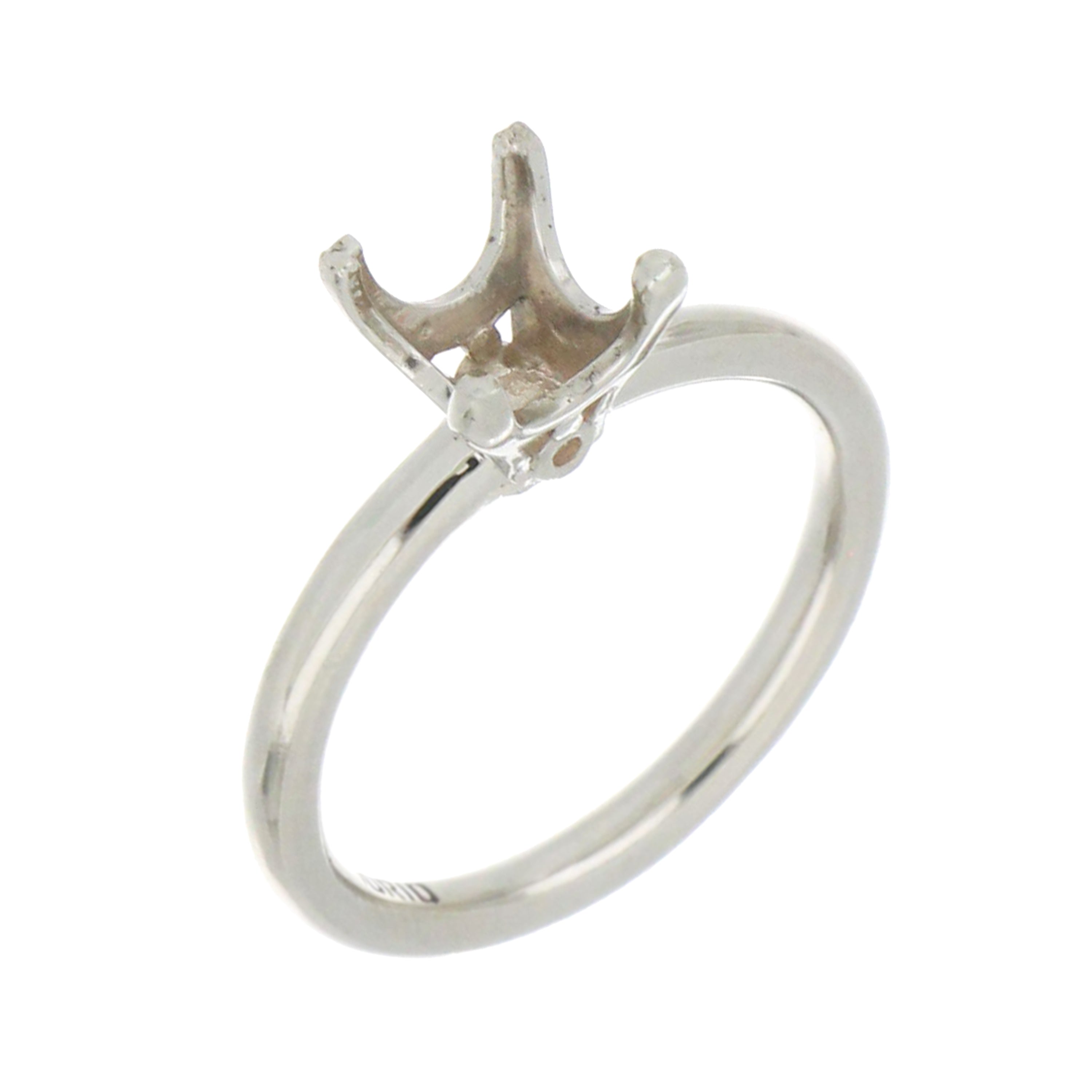 Side view of 14kt white gold solitaire ring mounting, polished finish, 4-claw prongs, ring size 6.75 visible