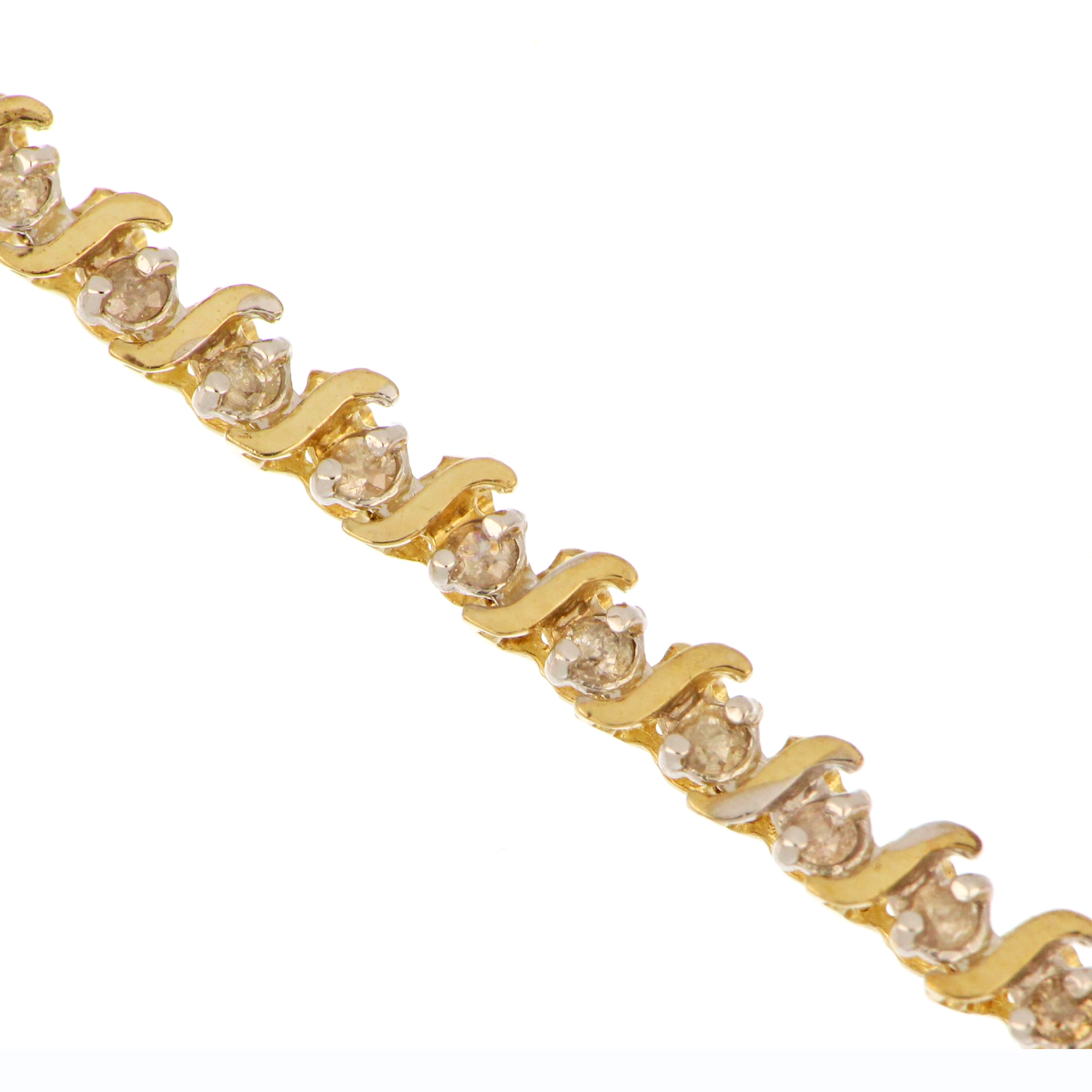 Detailed side view of 10kt white gold diamond tennis bracelet highlighting diamond settings and clasp