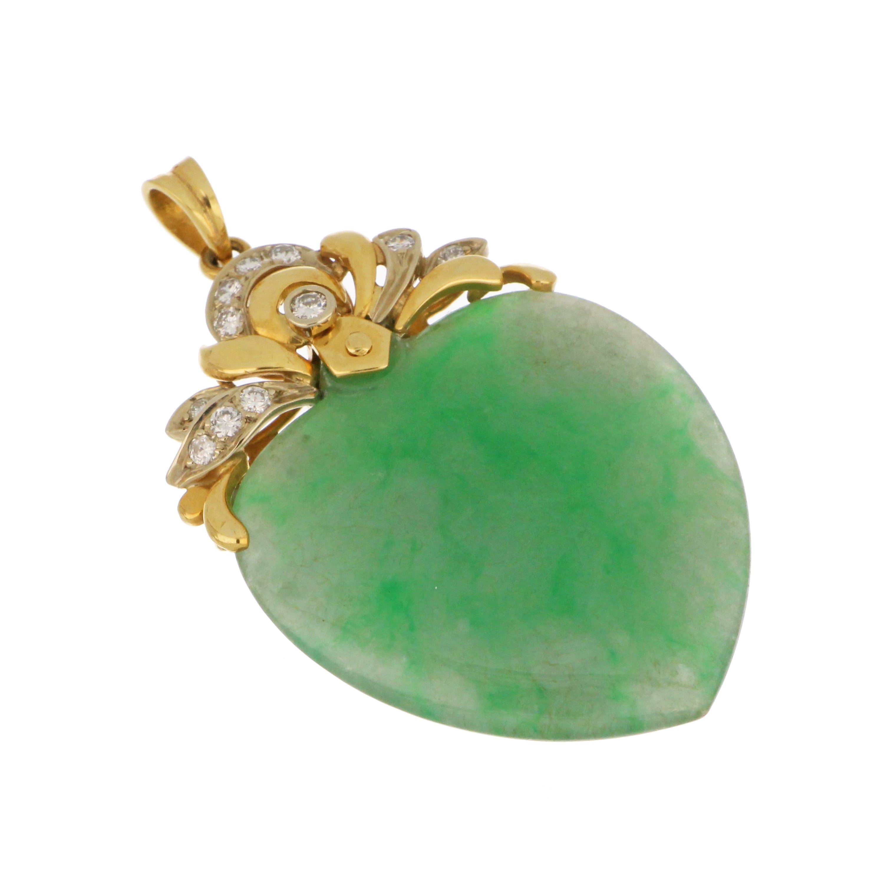 Close-up of 18kt yellow and white gold jadeite jade pendant with 11 round diamonds, detailed craftsmanship