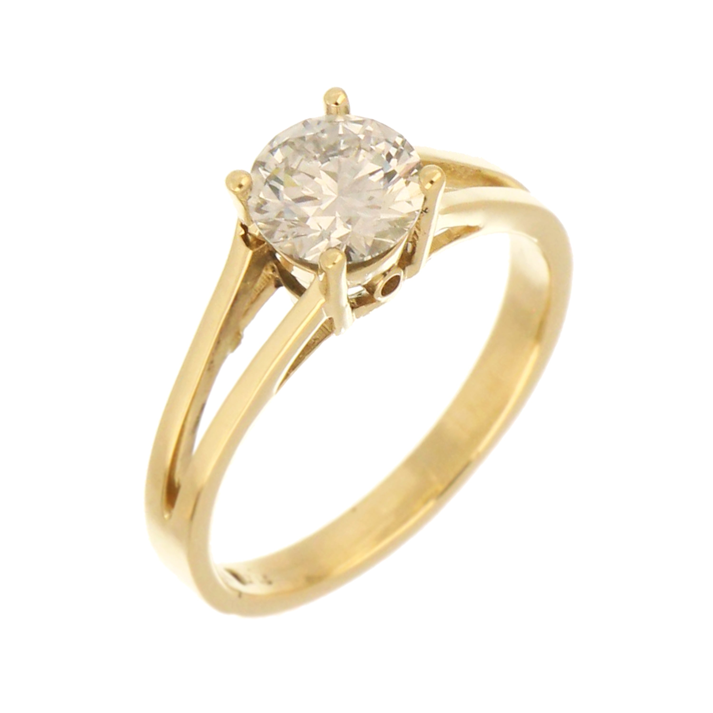 Side profile showing V-shaped polished shank and secured claw setting of the 14kt yellow gold solitaire diamond ring