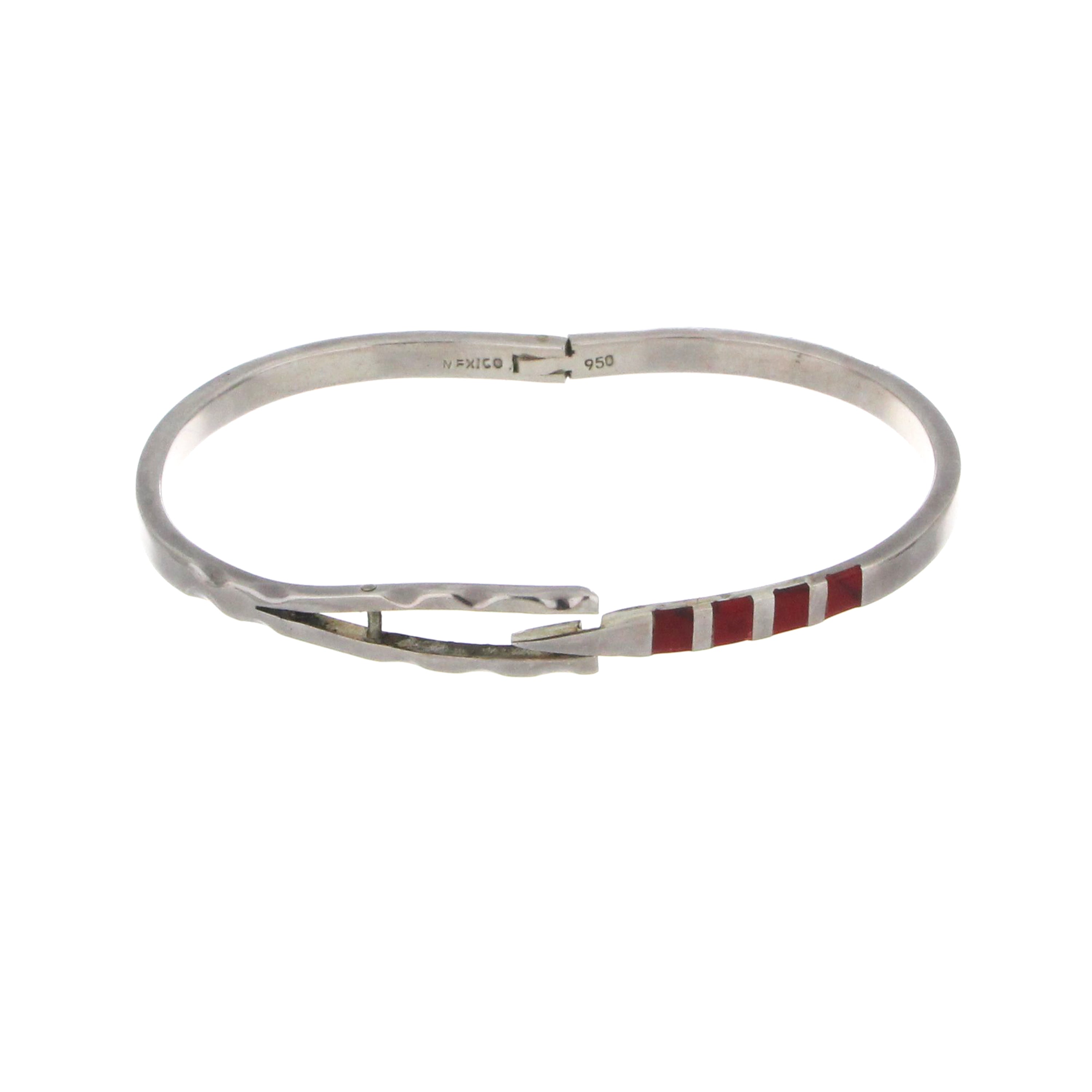 Side angle of sterling silver bangles featuring red stones, highlighting smooth curves and lustrous finish