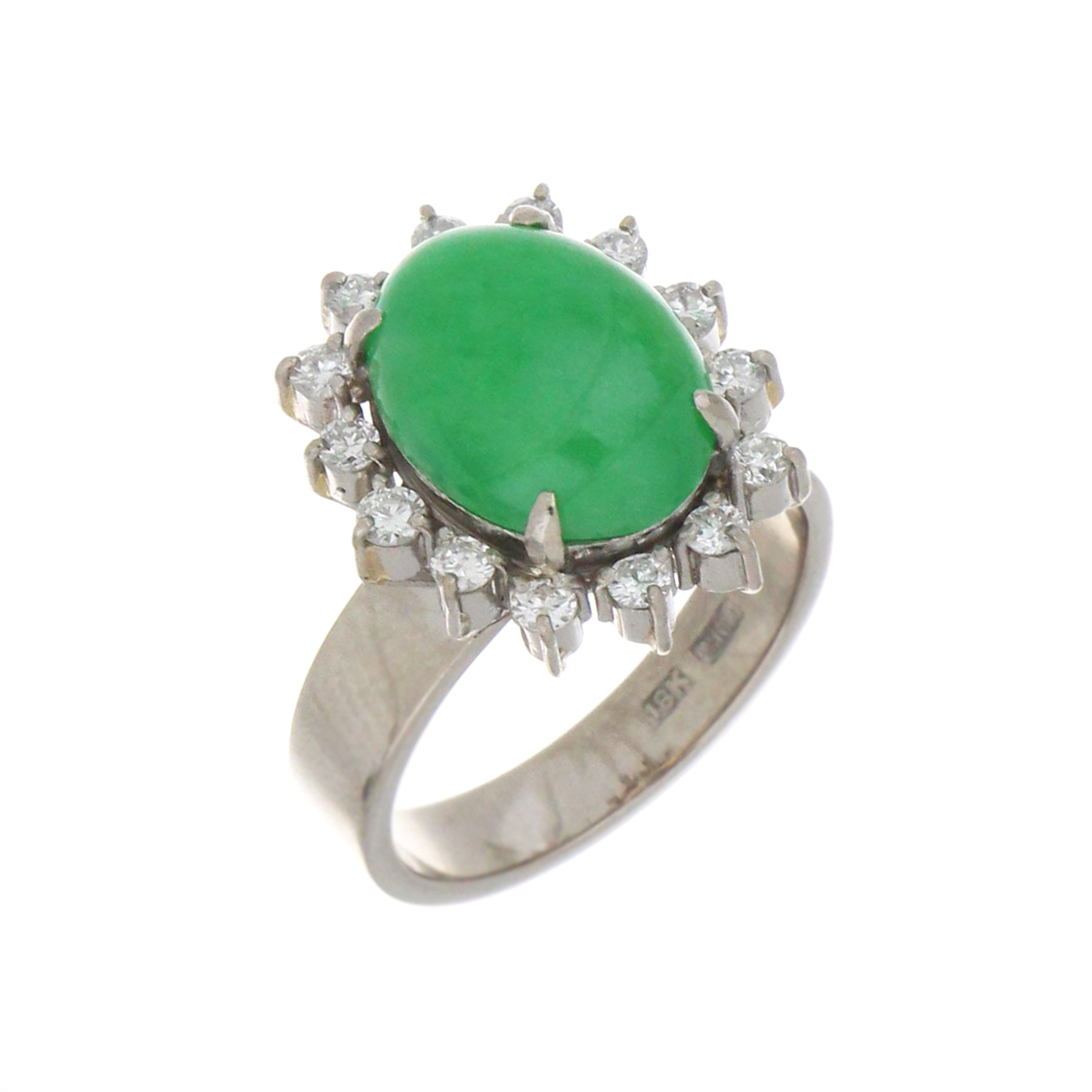 Close-up view of the 18kt white gold ring highlighting the oval cabochon jadeite jade and claw-set round diamonds