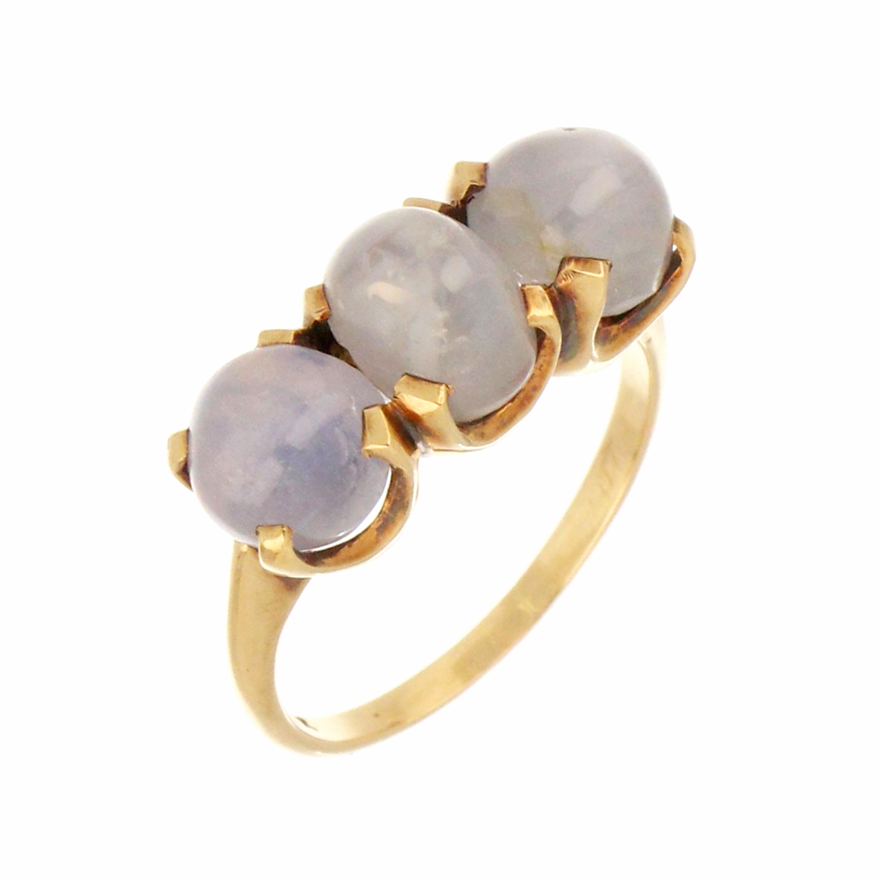 Vintage yellow gold dinner ring with natural blue star sapphire trio.