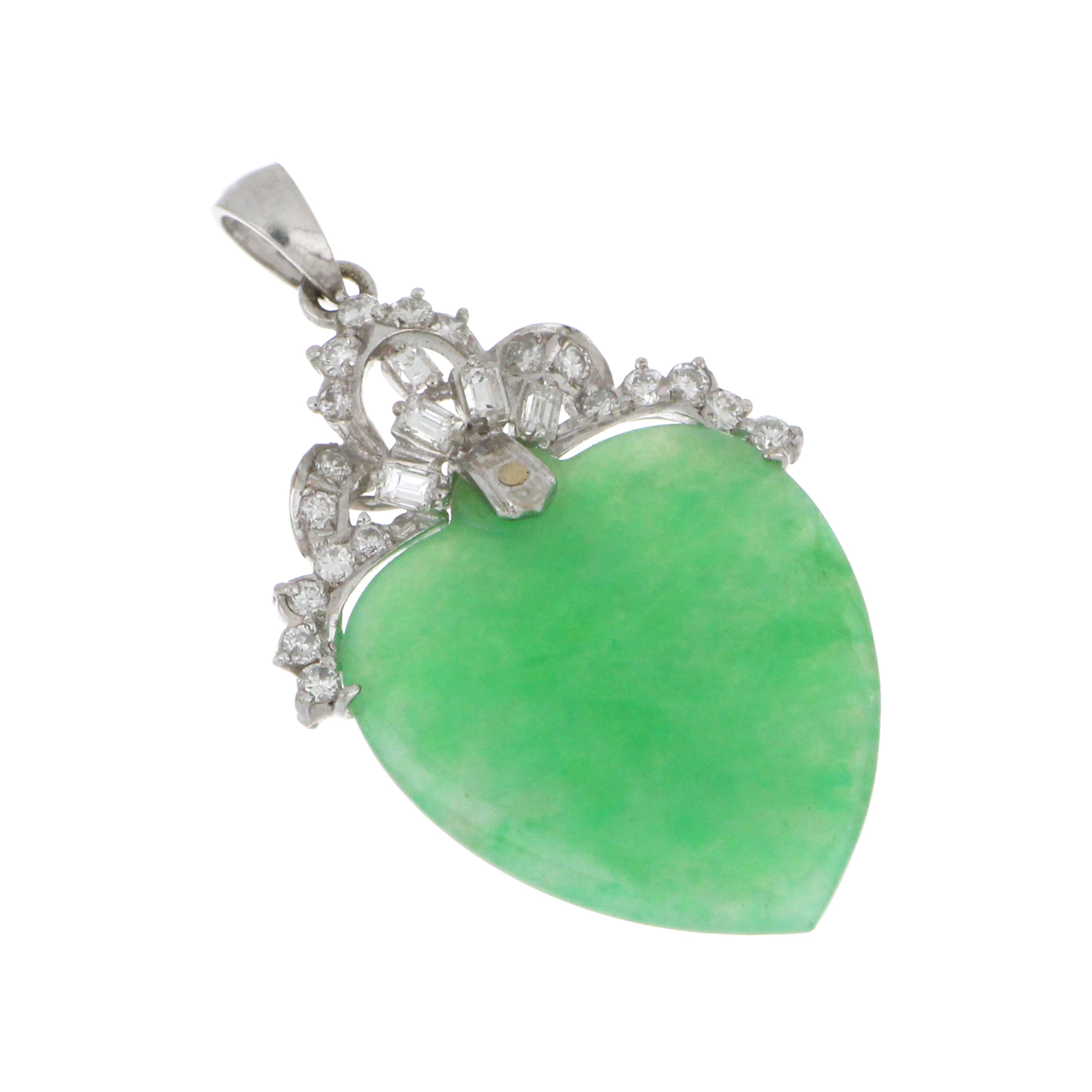 Close-up of 14kt white gold jadeite jade heart pendant showcasing diamond details and elegance