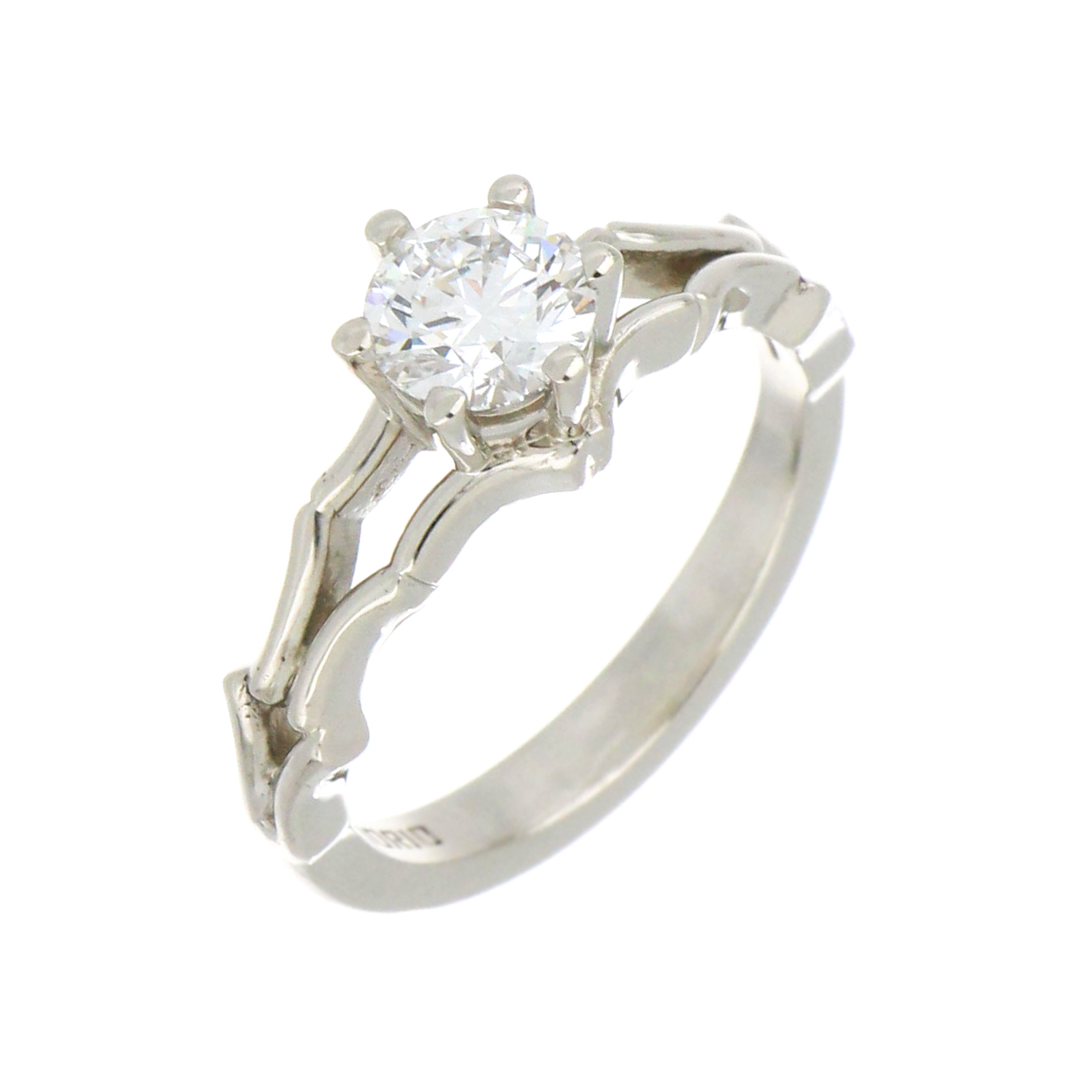 Close-up of round brilliant lab grown diamond set in 14kt white gold ring, clarity VS1, color D