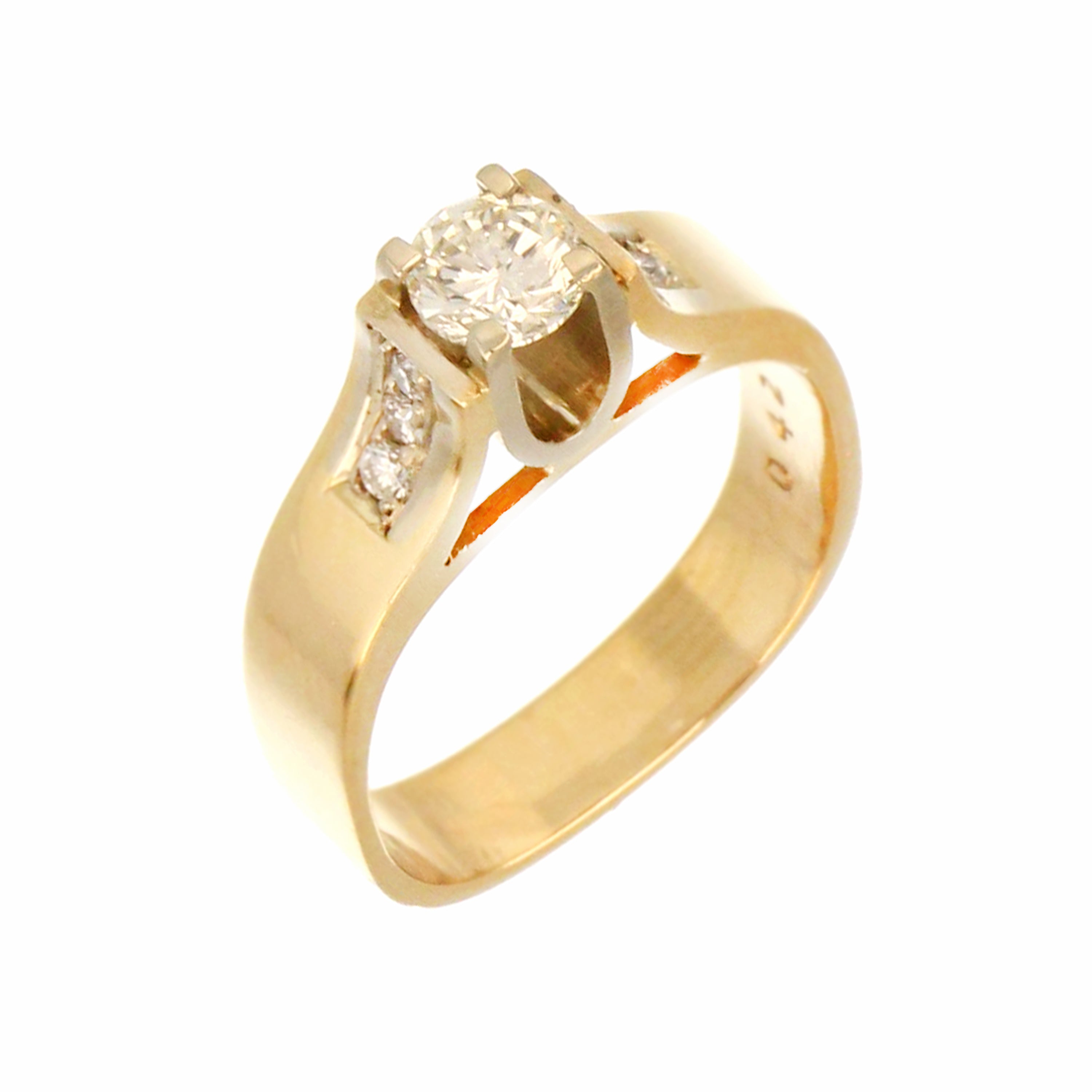 Side angle view of diamond ring showing the six round side diamonds and yellow gold band