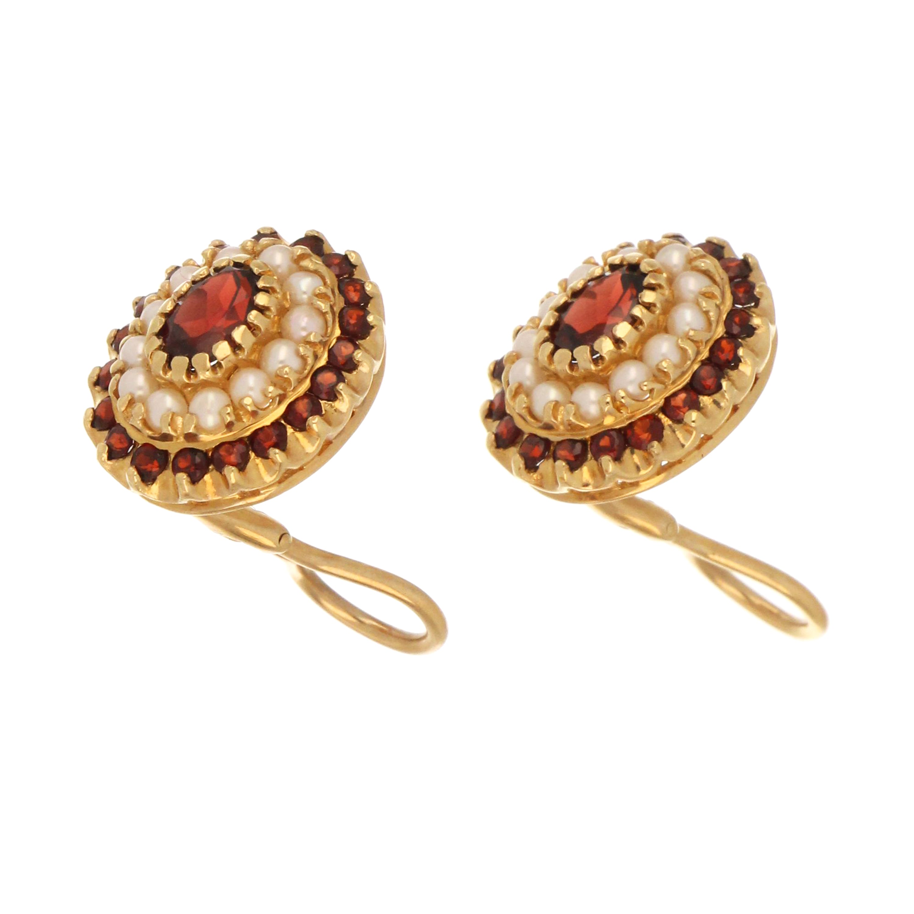 Side view of 14kt yellow gold garnet and pearl earrings with omega backings