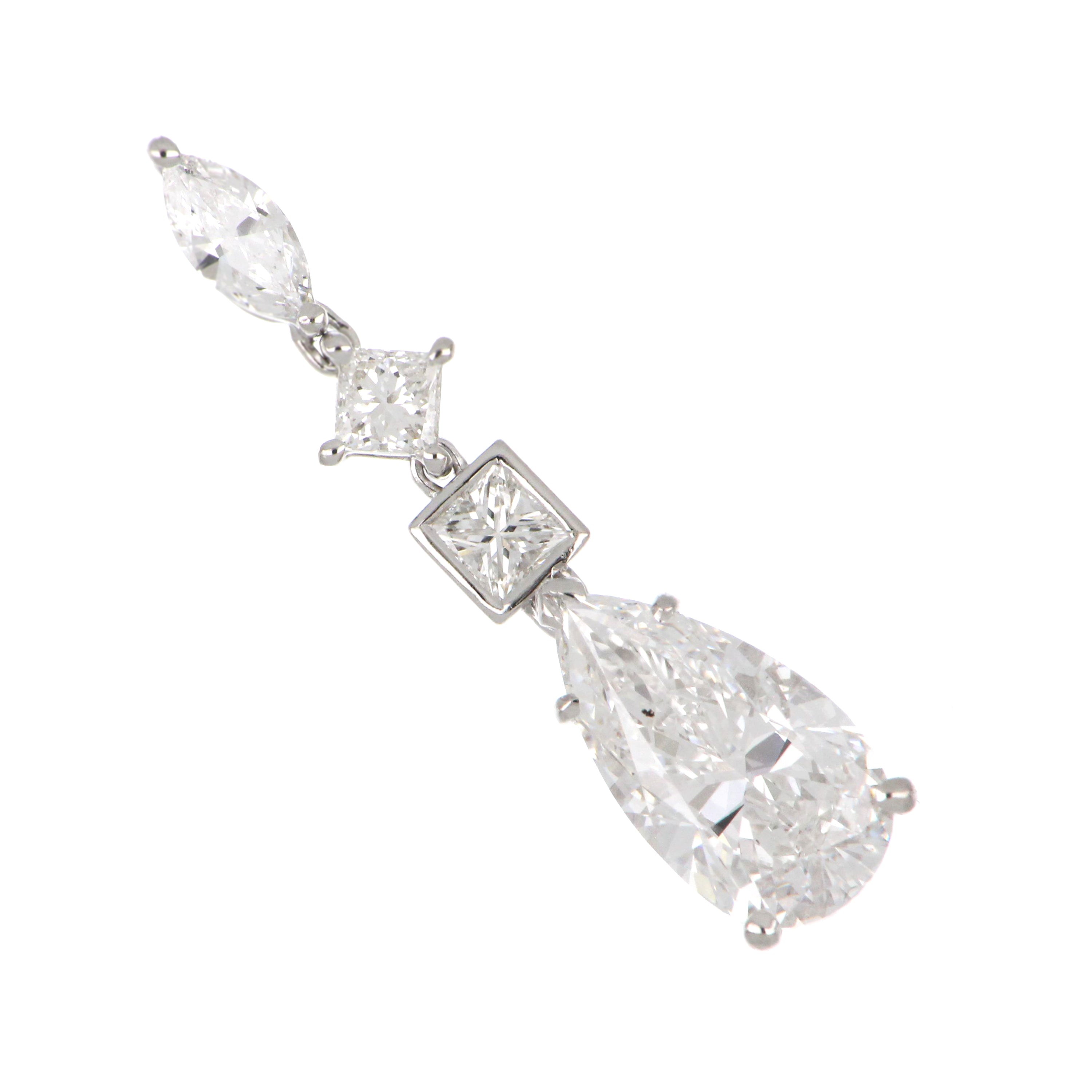 Side angle of elegant 18kt white gold diamond pendant highlighting setting and diamond clarity