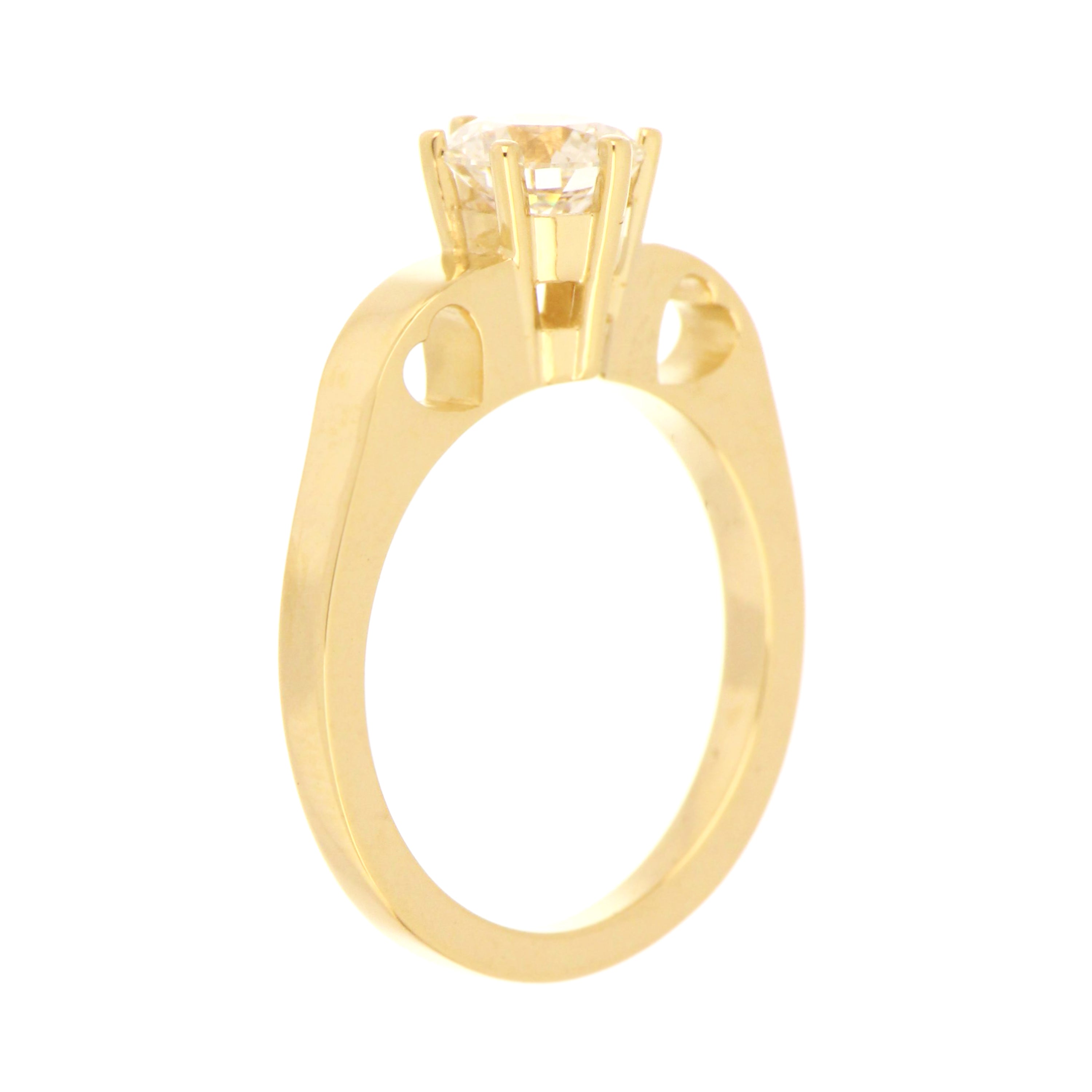 Side profile of 14kt yellow gold engagement ring highlighting polished flat edge shank
