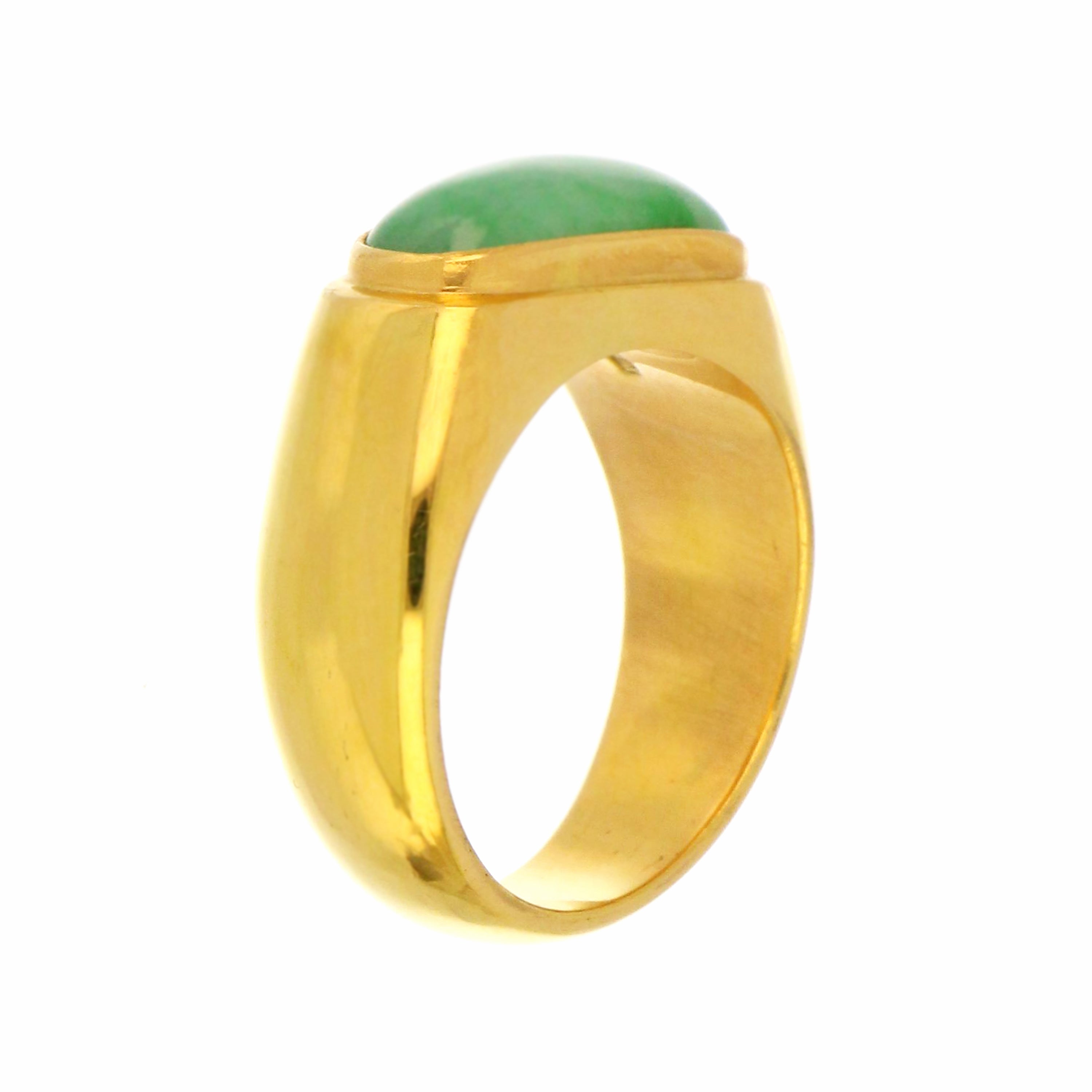 Angled close-up of 14kt yellow gold ring featuring saddle-shaped natural jadeite jade, weight approximately 9.15 grams