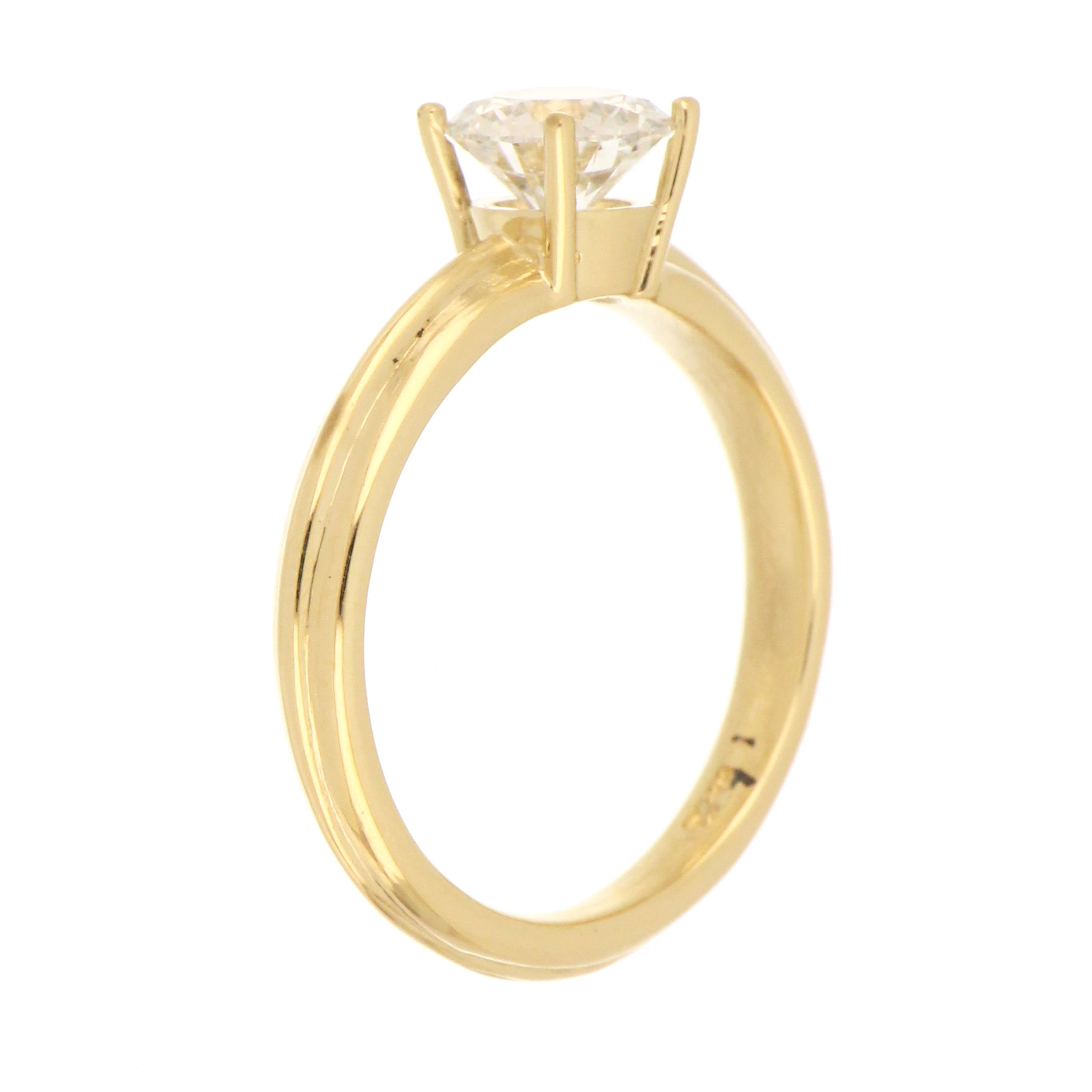 Elegant 14kt yellow gold engagement ring with VS2 clarity E color lab grown diamond, displaying band curvature