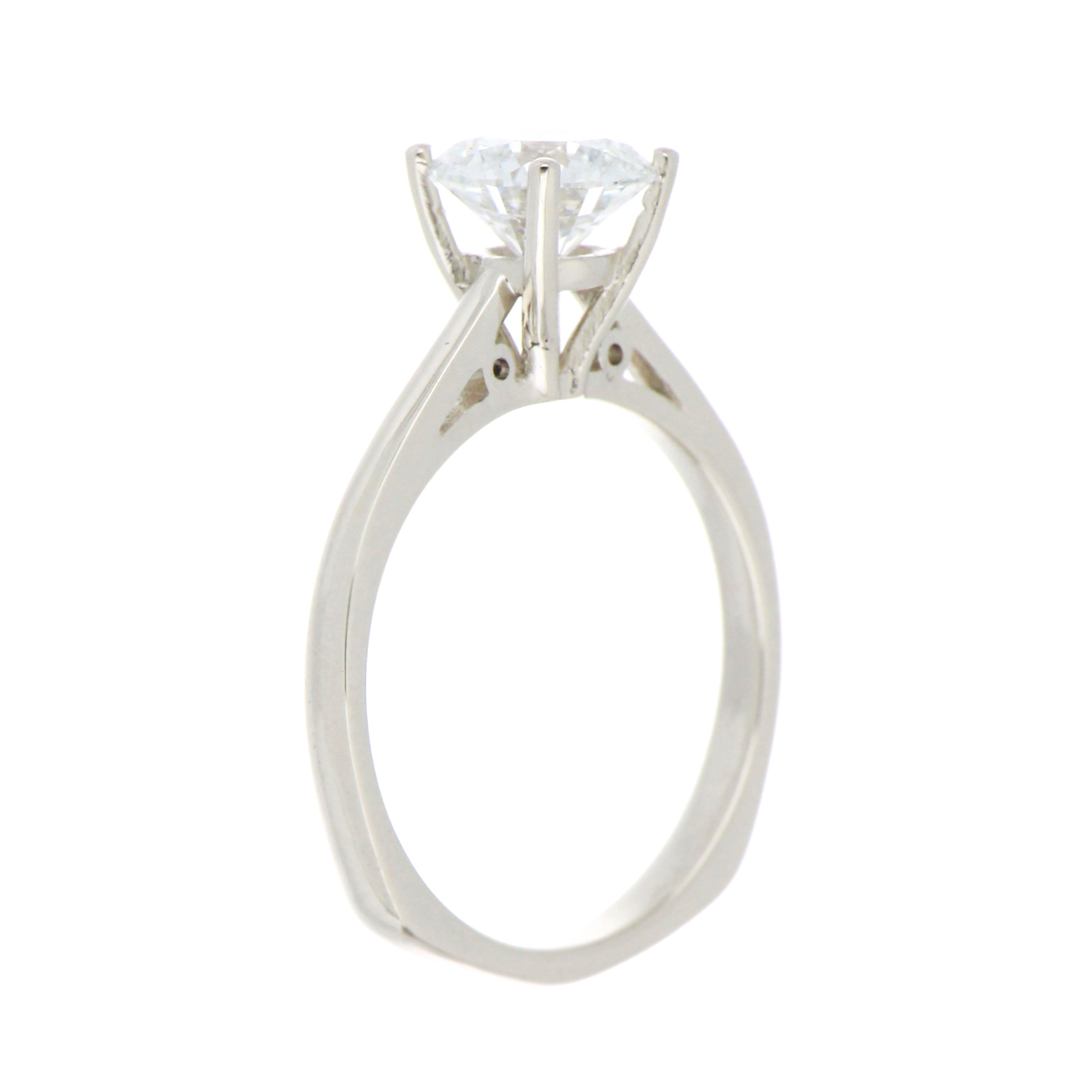 Side profile of 14kt white gold ring with 1.07ct round lab grown diamond setting, polished shank visible