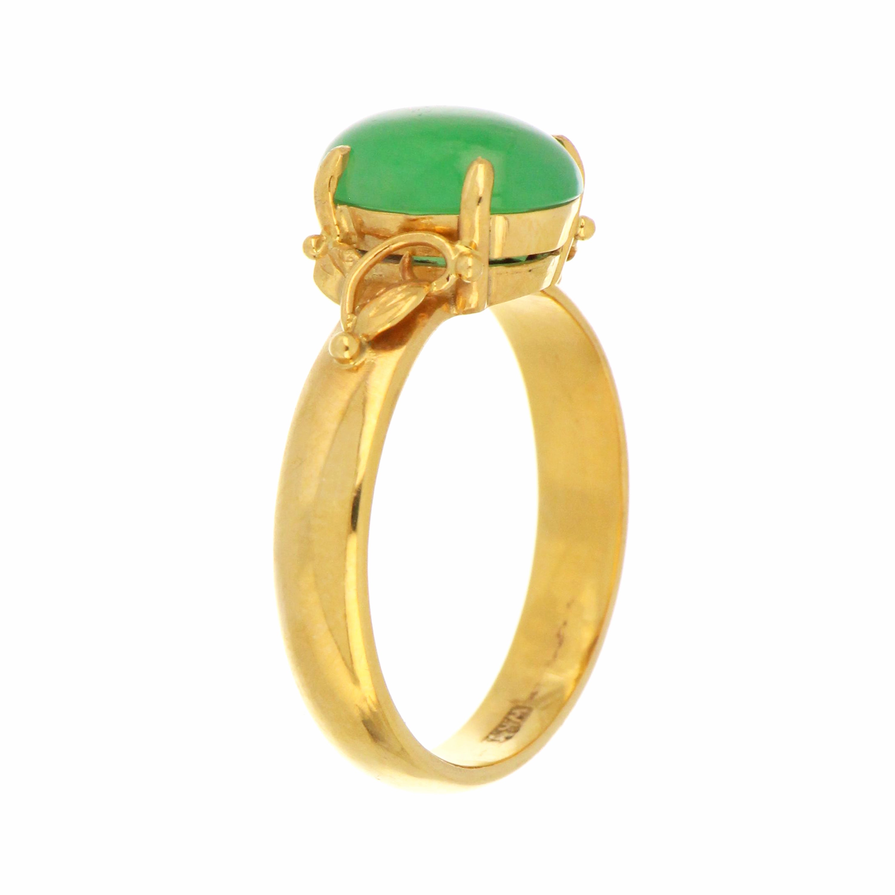 14kt yellow gold natural jadeite jade ring, top view emphasizing smooth cabochon stone and claw setting