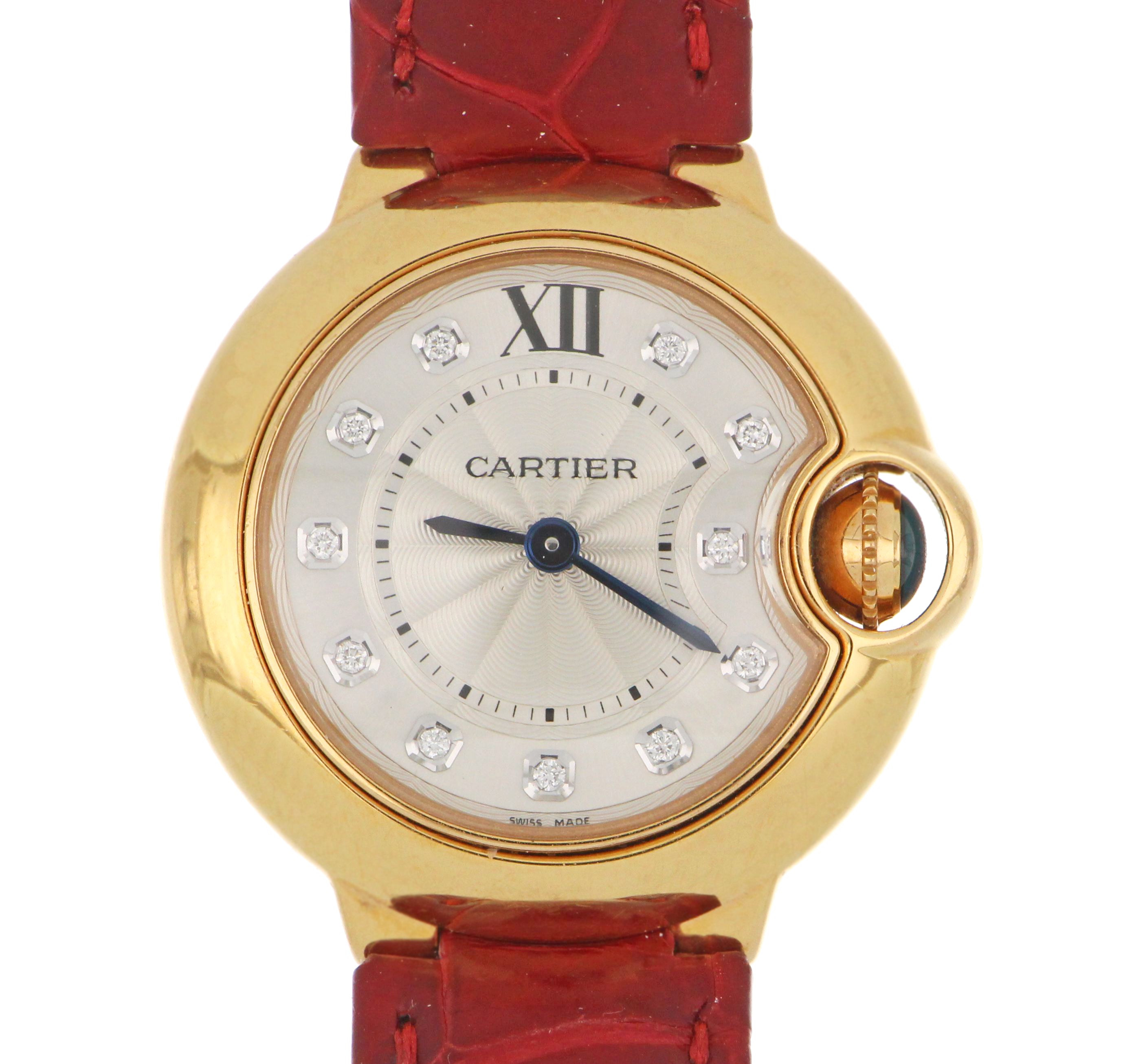 Side angle of Cartier Ballon Bleu showing yellow gold case and sapphire glass crystal