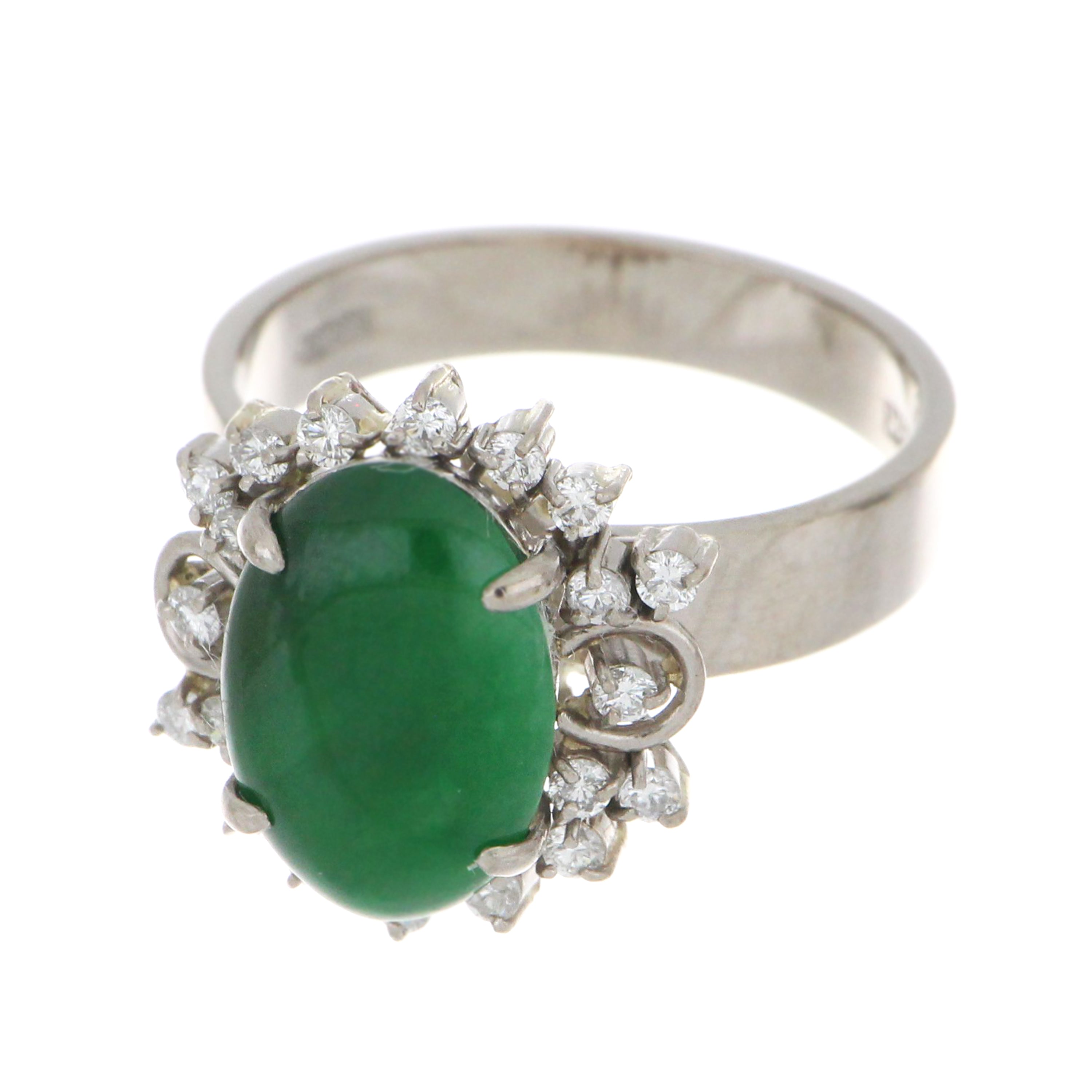 Detailed view of natural jadeite jade and diamond arrangement on 18kt white gold ring