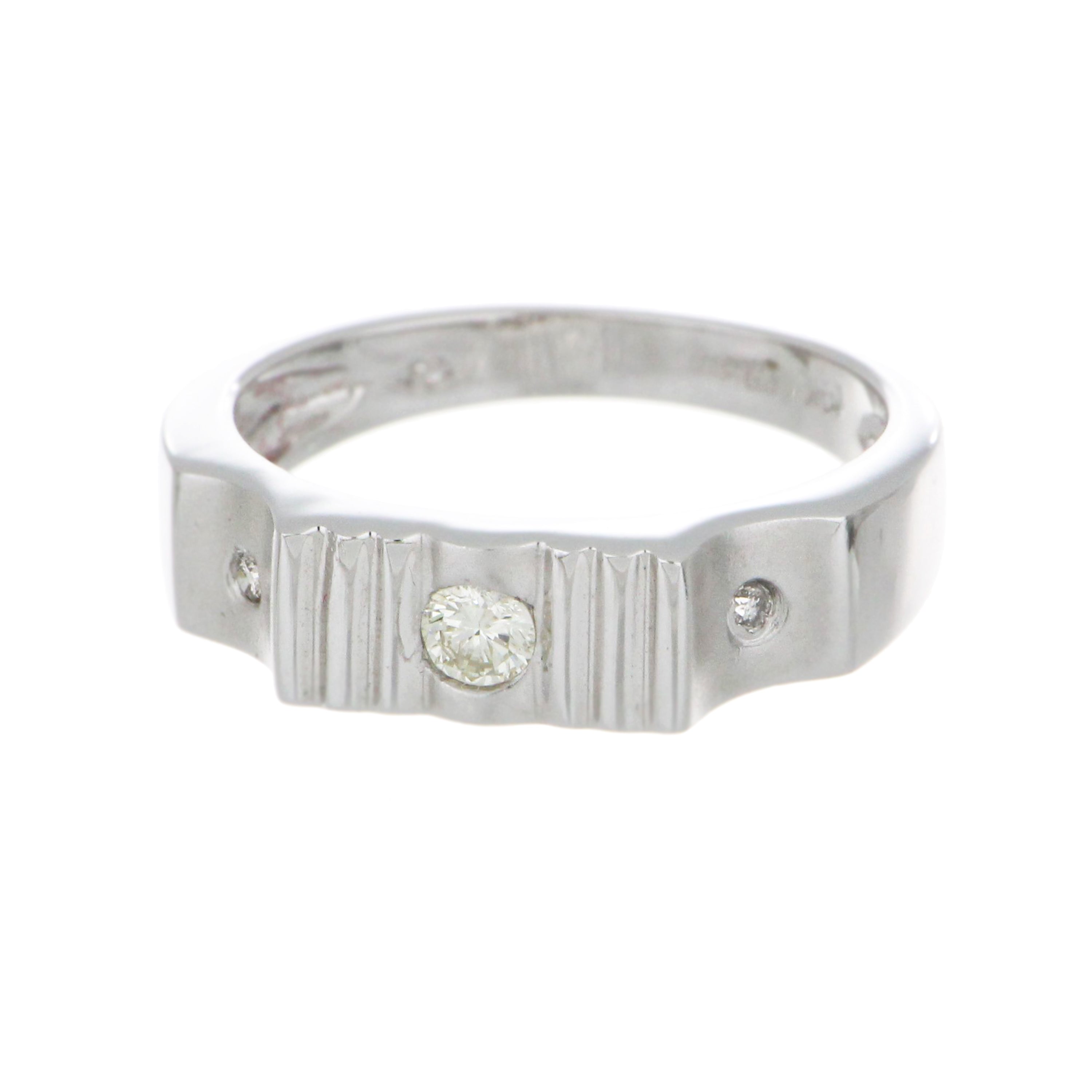 Oblique angle of 14kt white gold diamond ring with round diamonds, ideal collectible jewelry piece