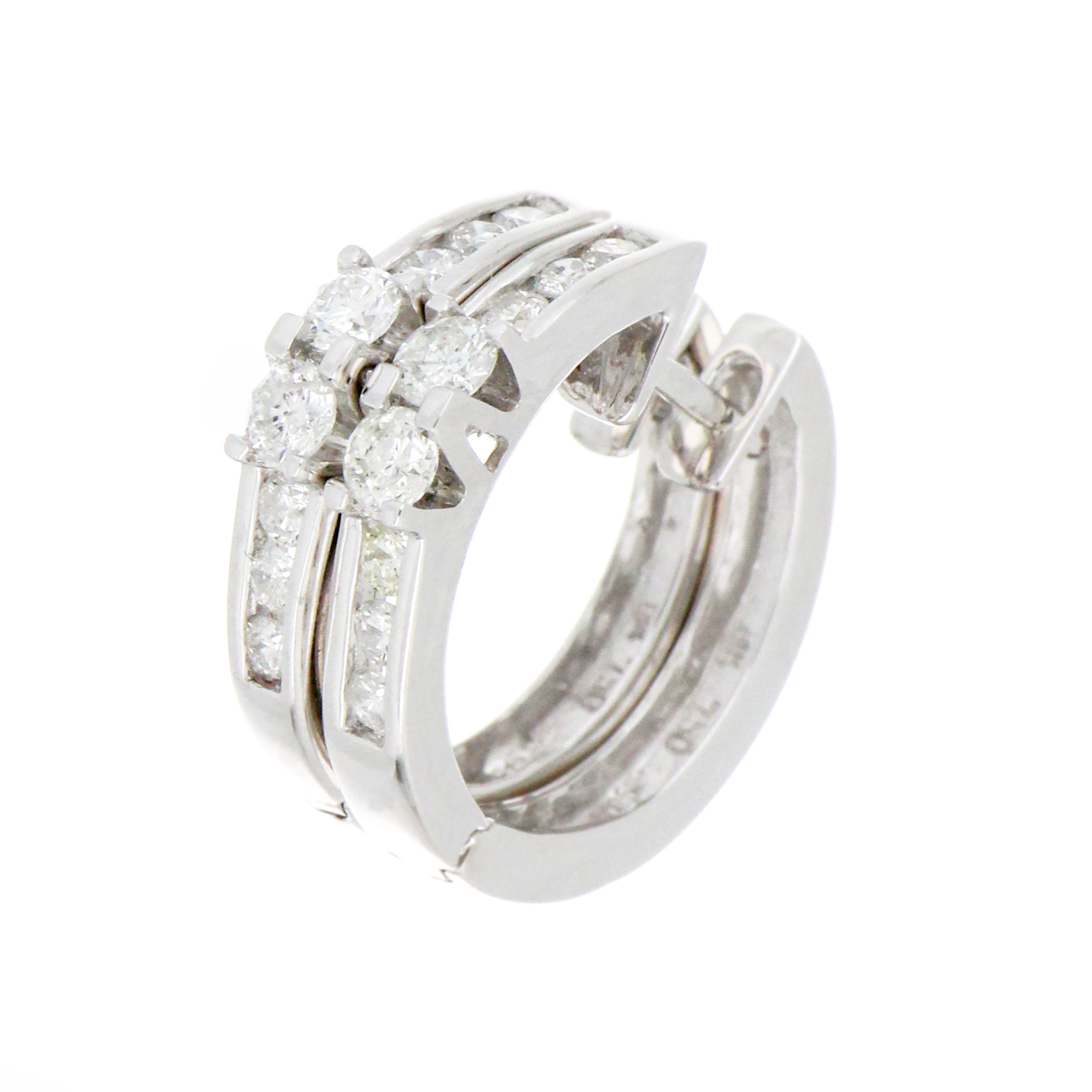 Close-up of elegant 18kt white gold diamond hoop earring showing round brilliant and full-cut diamonds in claw and channel settings