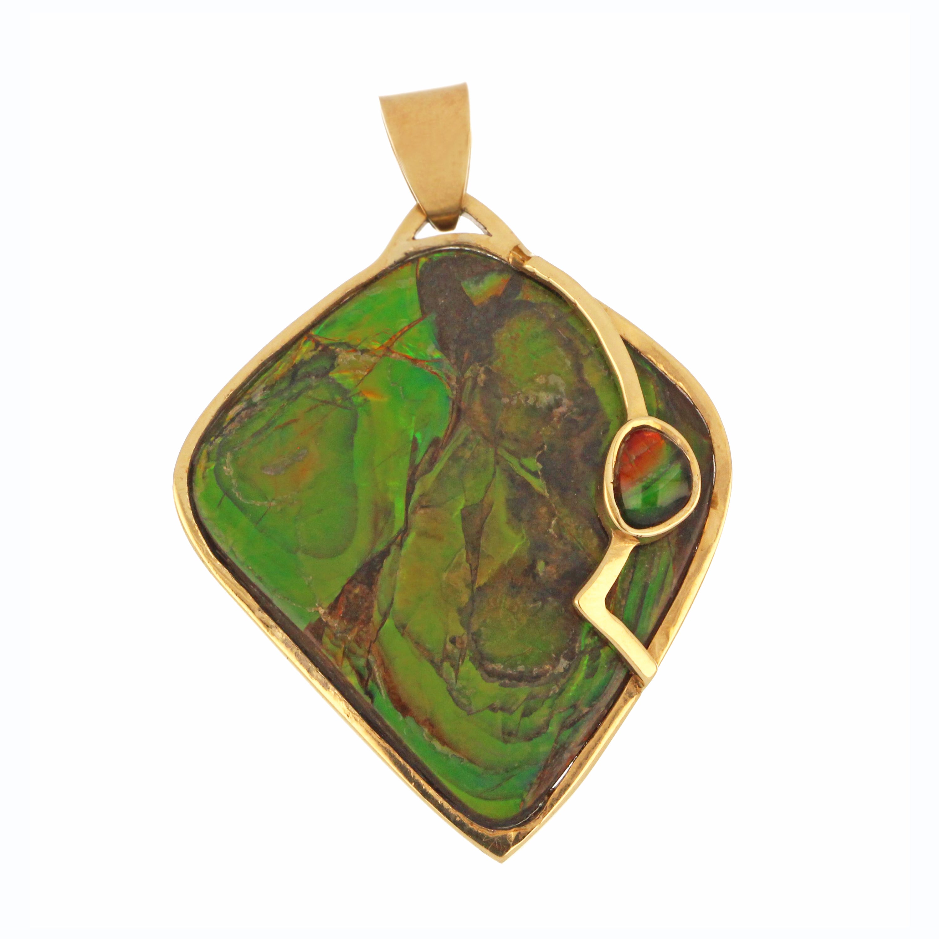 Detailed side view of 14kt yellow gold ammolite pendant showing stone color variations and unique shape