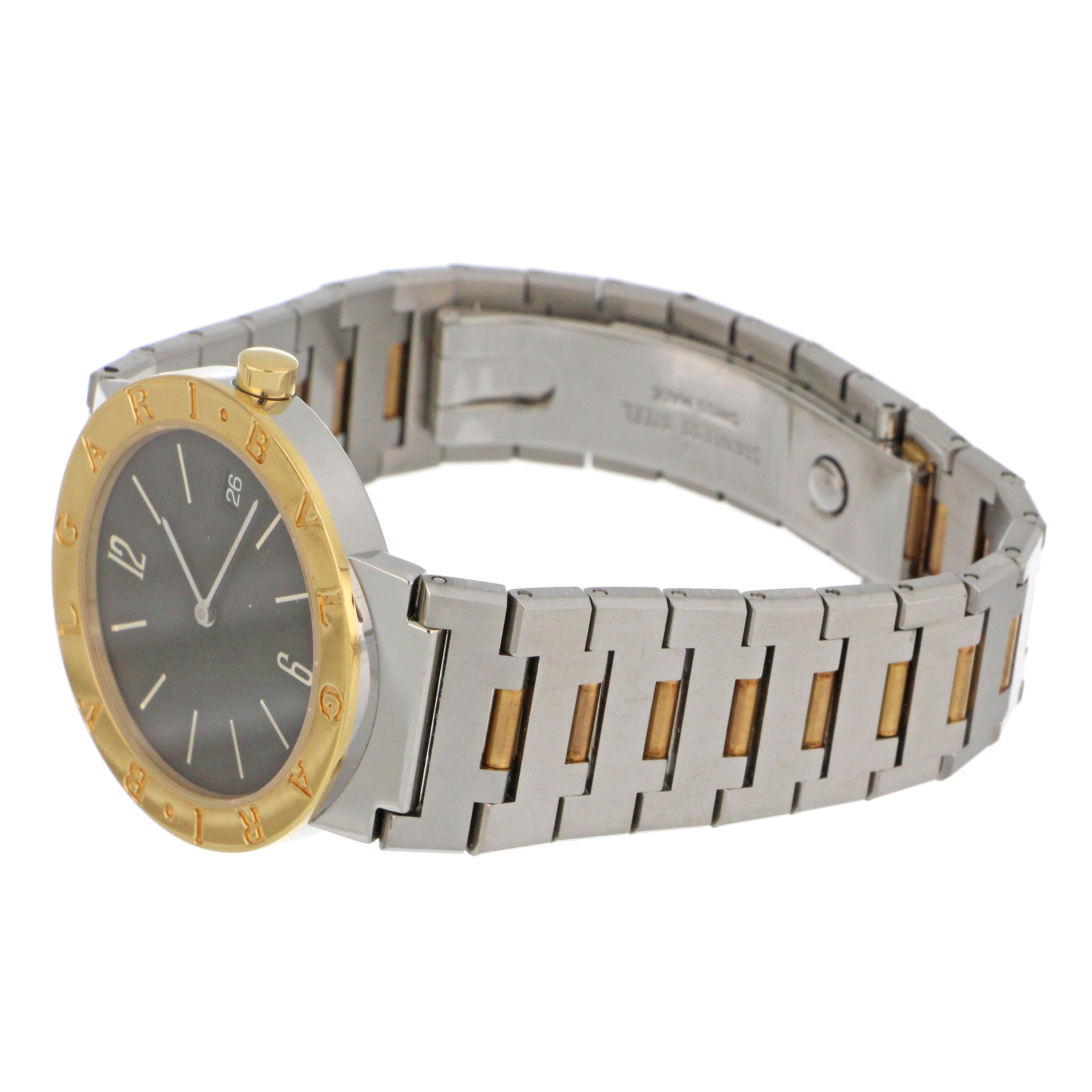 Mens' Bvlgari watch bracelet polished stainless steel links under light showing gentle reflections