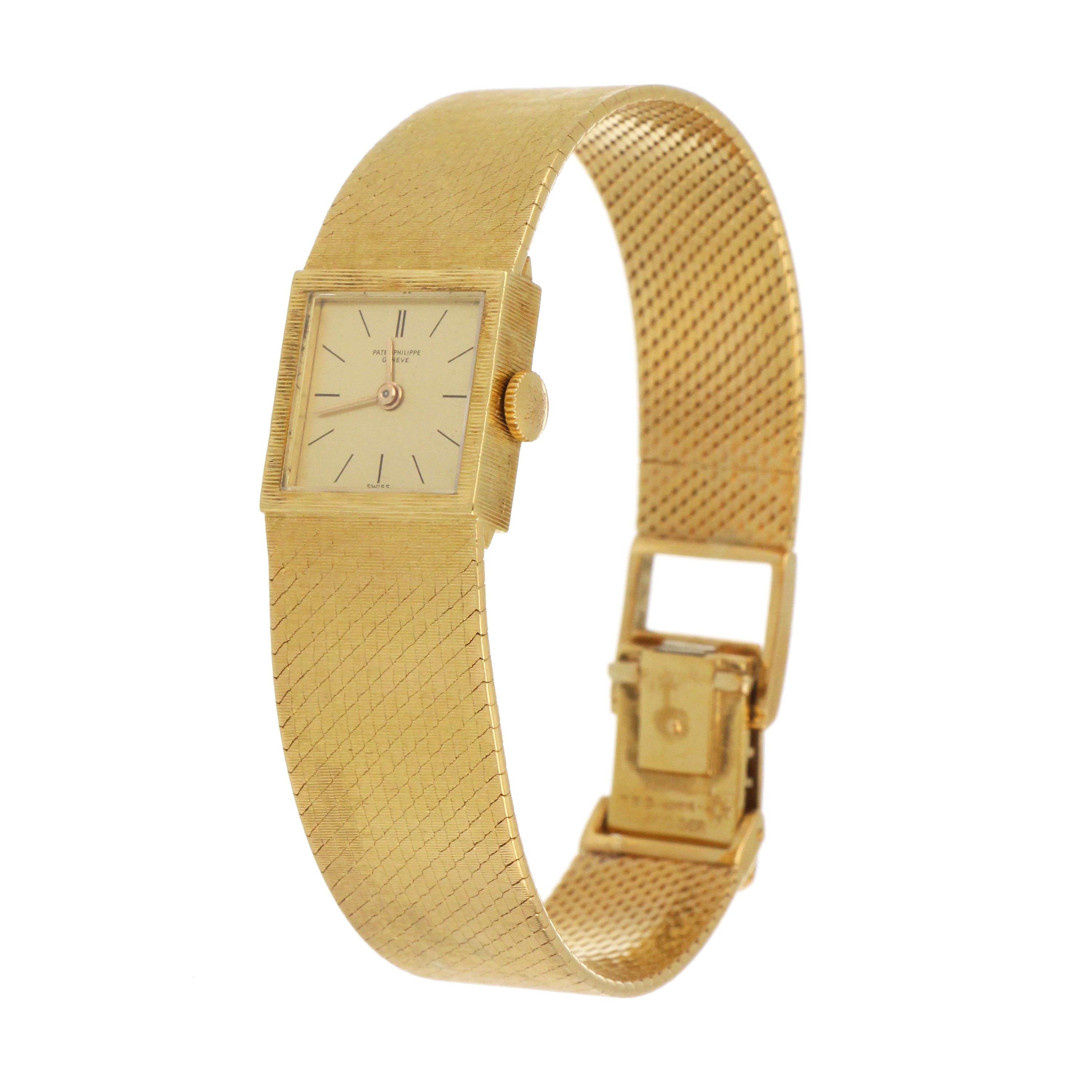 18kt yellow gold ladies Patek Philippe watch front view with champagne dial