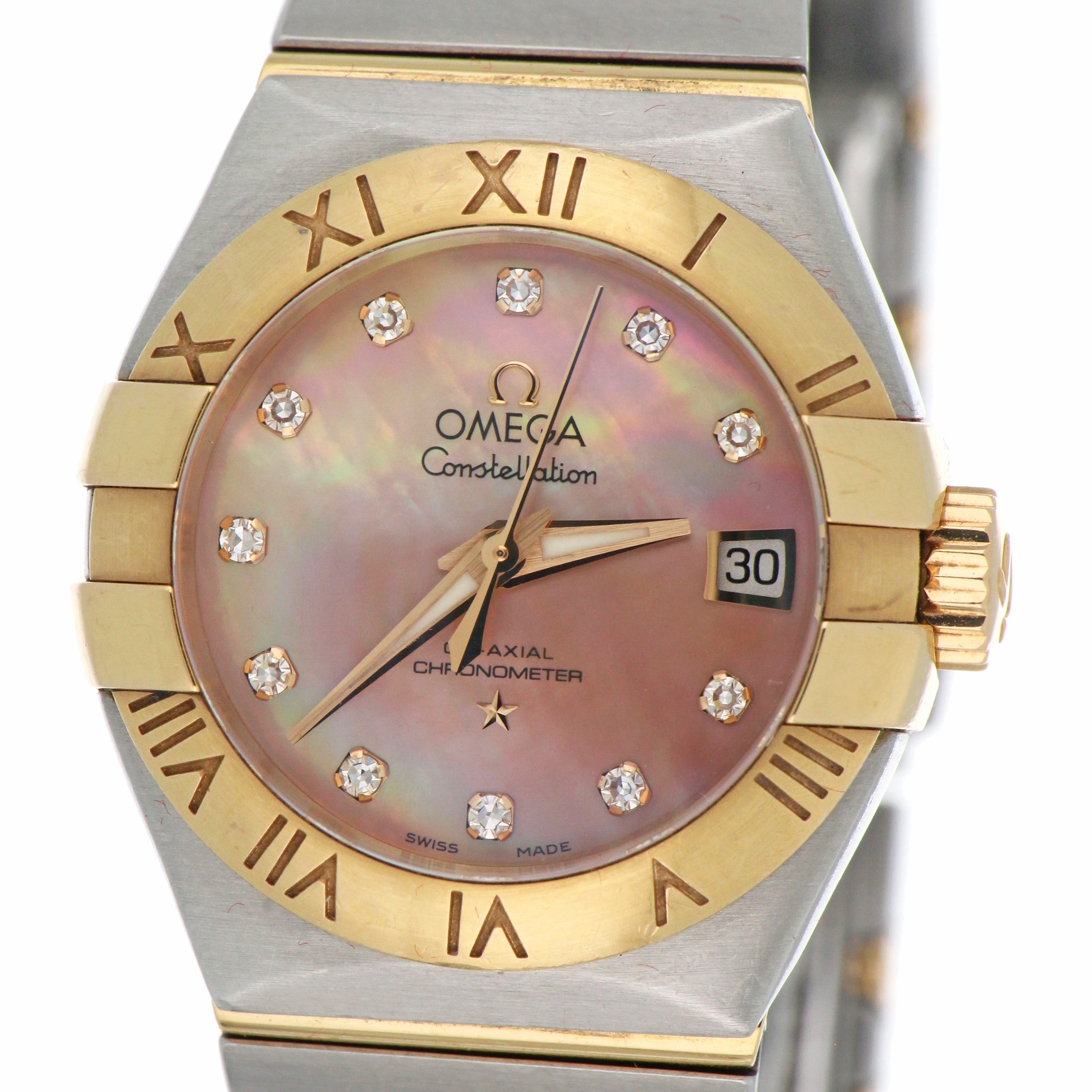 Ladies Omega Constellation watch front view showing mother-of-pearl dial with diamond hour markers and 18kt yellow gold bezel