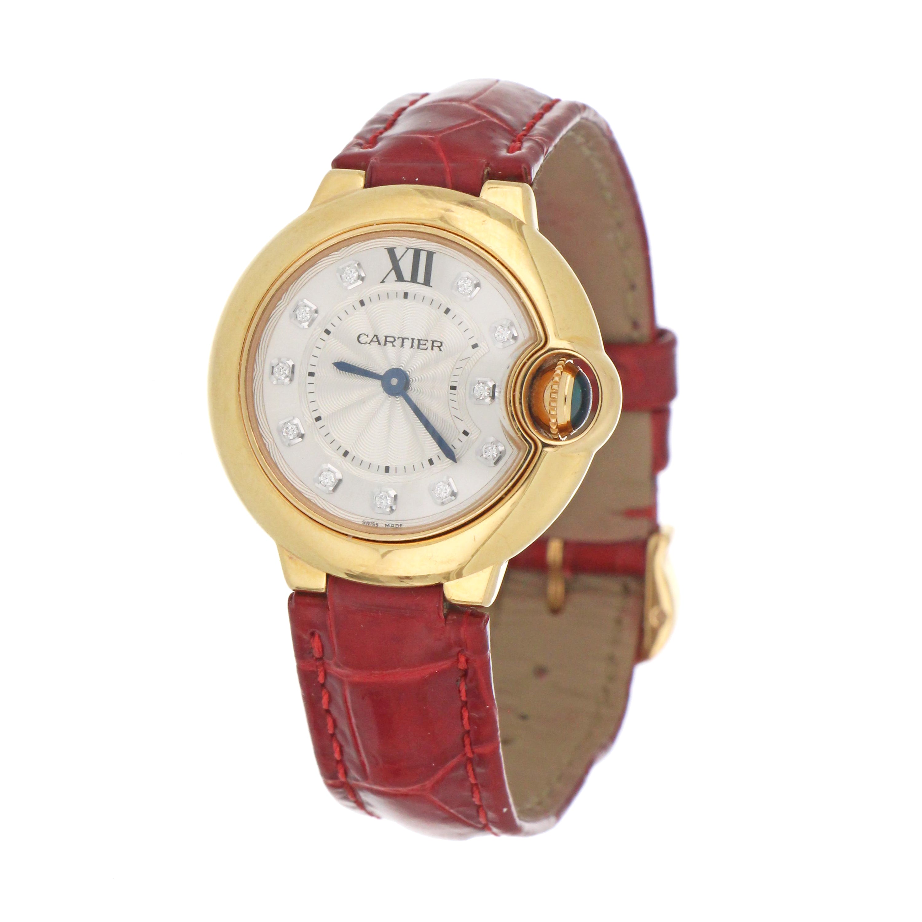 Close-up of Cartier Ballon Bleu watch dial and pin buckle clasp on red leather strap